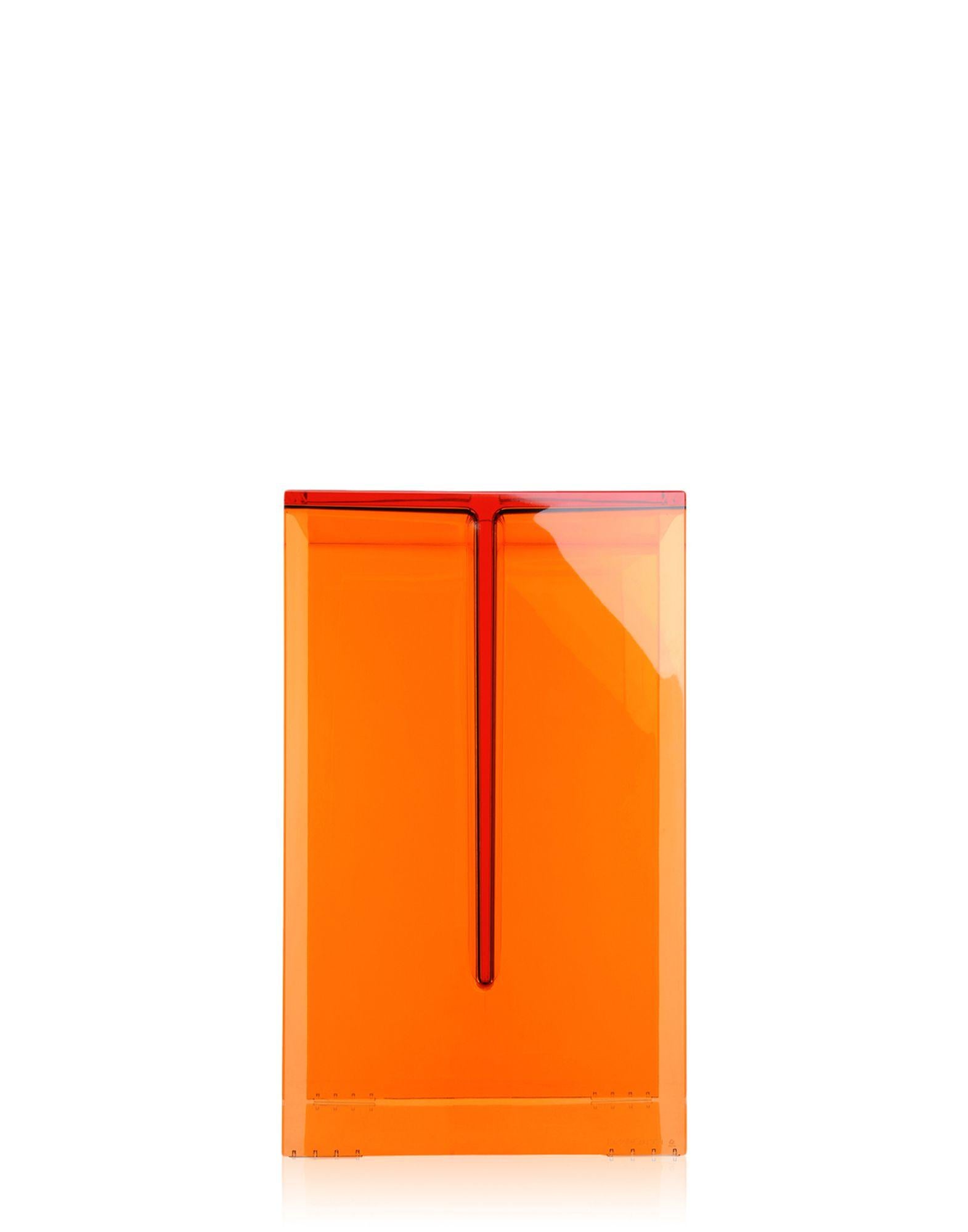 Monolithic stool/table made of transparent plastic, with a thickness that emphasises its geometric purity. A practical, functional and versatile accessory, for use anywhere in the home.

Dimensions: Height: 18.5 in.; Width: 13 in.; Depth: 10.75