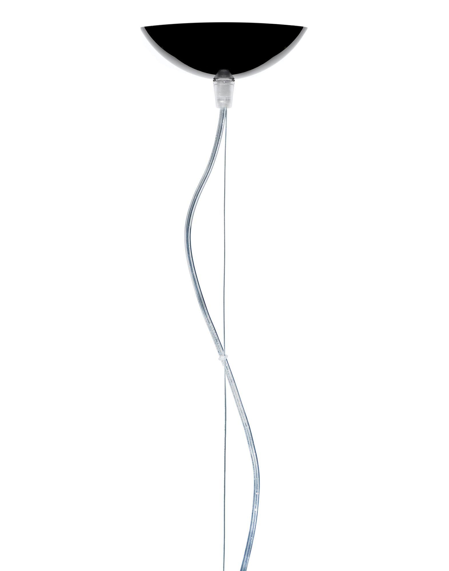 An essential lamp which is characterised by the “subtle interpretations of the theme. Made in transparent methacrylate in glossy black, the cover is not perfectly hemispherical but the cut-off is underneath the height of the diameter to collect the