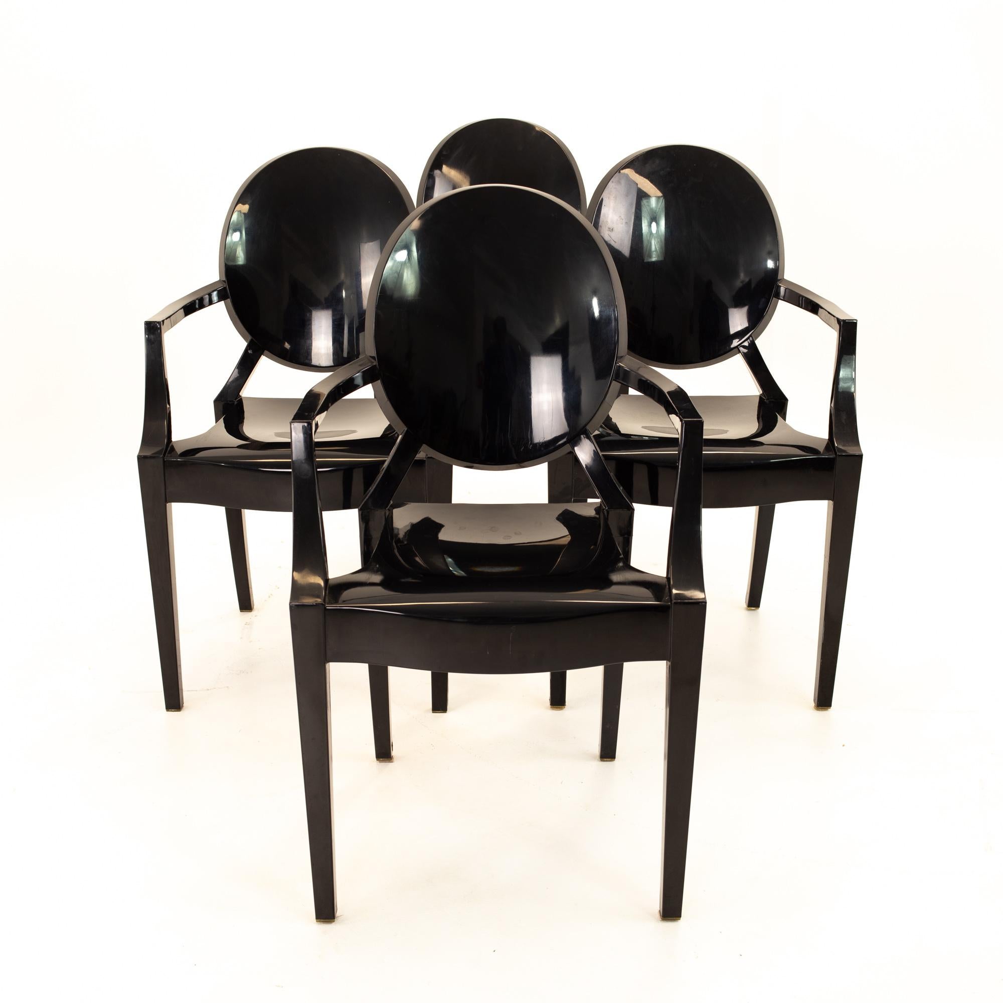 Kartell Mid Century black acrylic ghost dining chairs, set of 4
Each chair measures: 21.25 wide x 22 deep x 36.5 high with a seat height of 19 inches

This set is available in what we call restored vintage condition. Upon purchase it is thoroughly