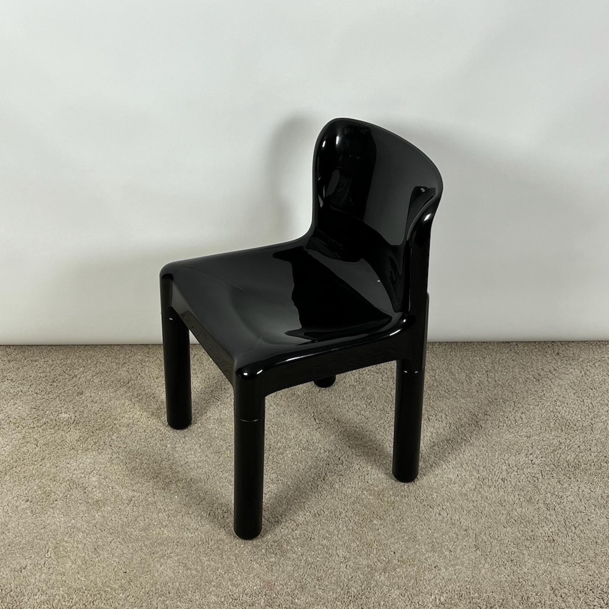 Mid-century Kartell Model 4875 Chair, designed by Carlo Bartoli in the 70s. A groundbreaking creation, the 4875 is hailed as the world’s first chair made of injection-molded polypropylene, showcasing Bartoli’s innovative vision. Kartell commenced