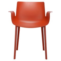 Chaise Kartell Piuma en orange rouille de Piero Lissoni