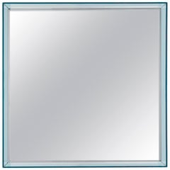 Miroir court Only Me de Kartell en bleu clair de Philippe Starck