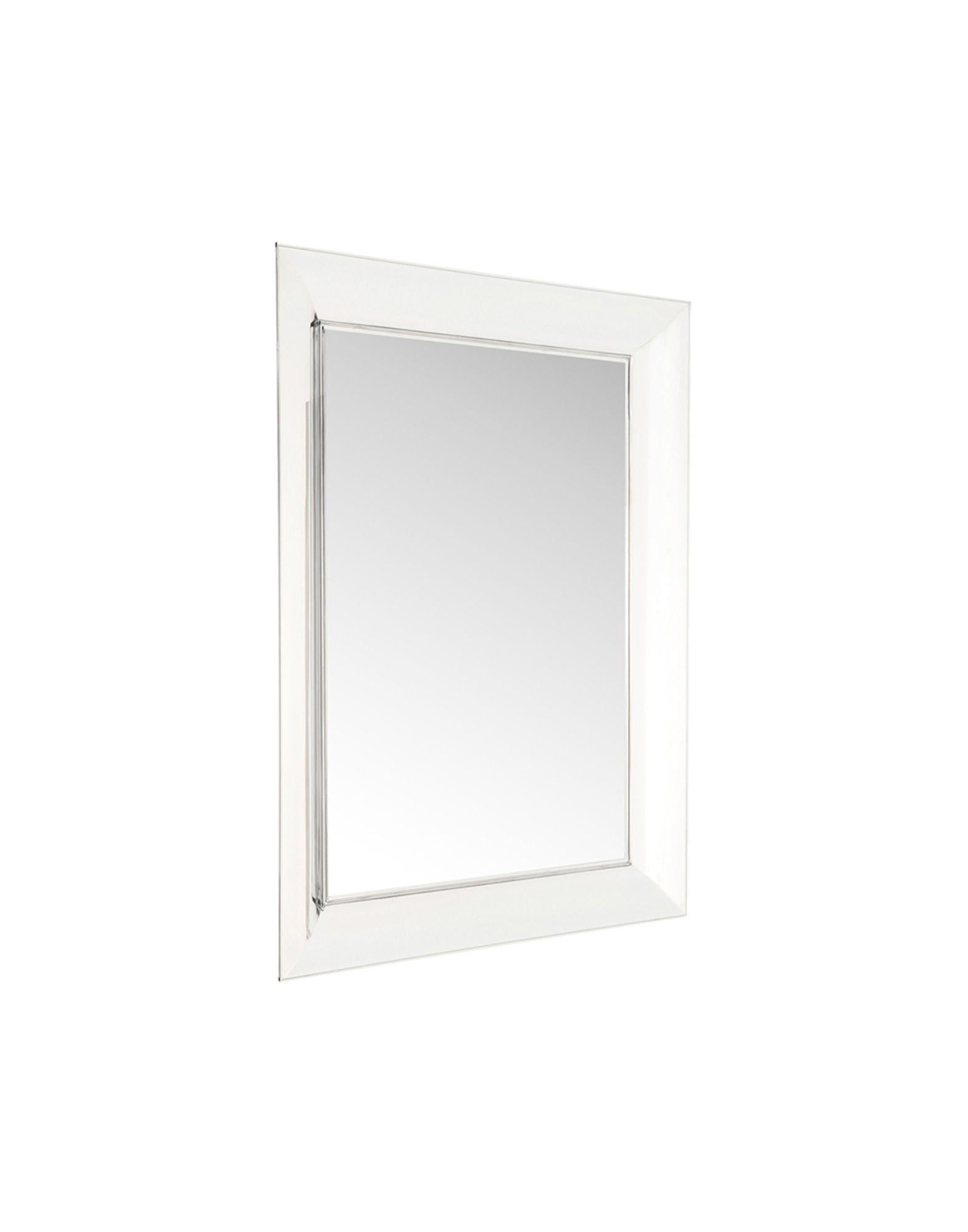 A series of rectangular two-dimensional wall mirrors which bring to mind milled crystal frames. The frames are made of transparent or colored polycarbonate with seagull wing sections and can be hung horizontally or vertically. Designed for