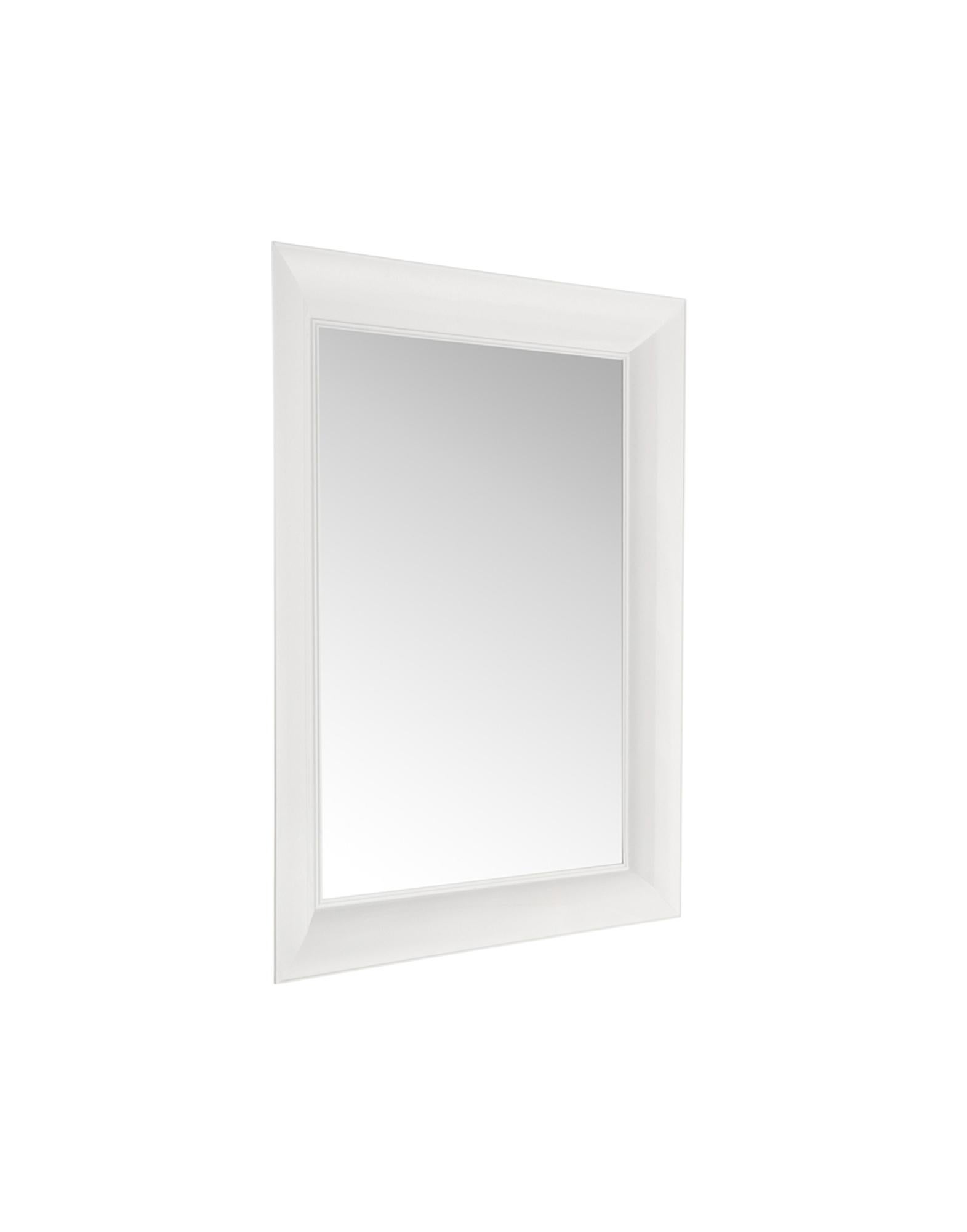 A series of rectangular two-dimensional wall mirrors which bring to mind milled crystal frames. The frames are made of transparent or colored polycarbonate with seagull wing sections and can be hung horizontally or vertically. Designed for