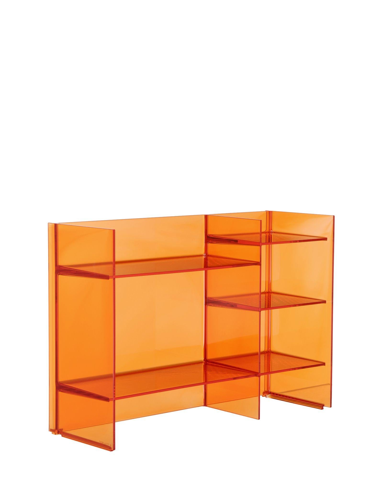 Multi-shaped and multi-purpose shelving system, stackable and modular, offering the possibility of creating a variety of geometric and chromatic compositions. This accessory can play the Dual role as both container and room divider. IT IS a