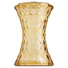 Tabouret Kartell en pierre jaune par Marcel Wanders