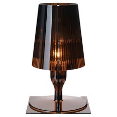 Lámpara Kartell Take en Smoke de Ferruccio Laviani
