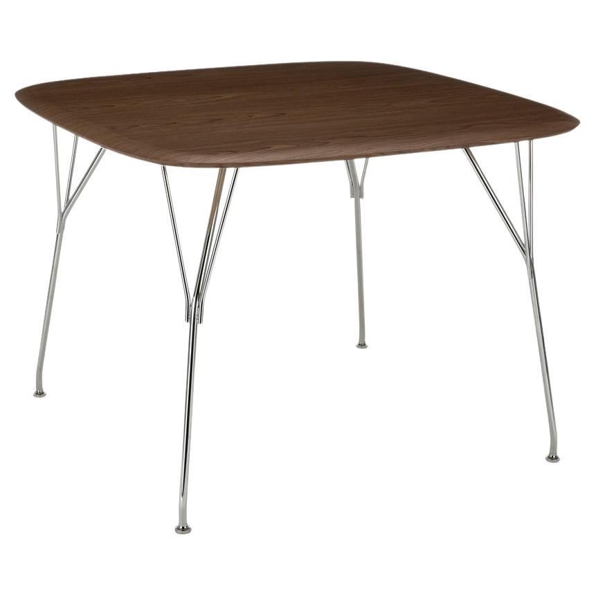 Mesa Kartell Vizconde de madera de Philippe Stark en nogal y marco cromado