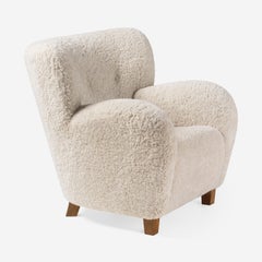 Karu Lounge Chair in Cream Sheepskin by Dagmar