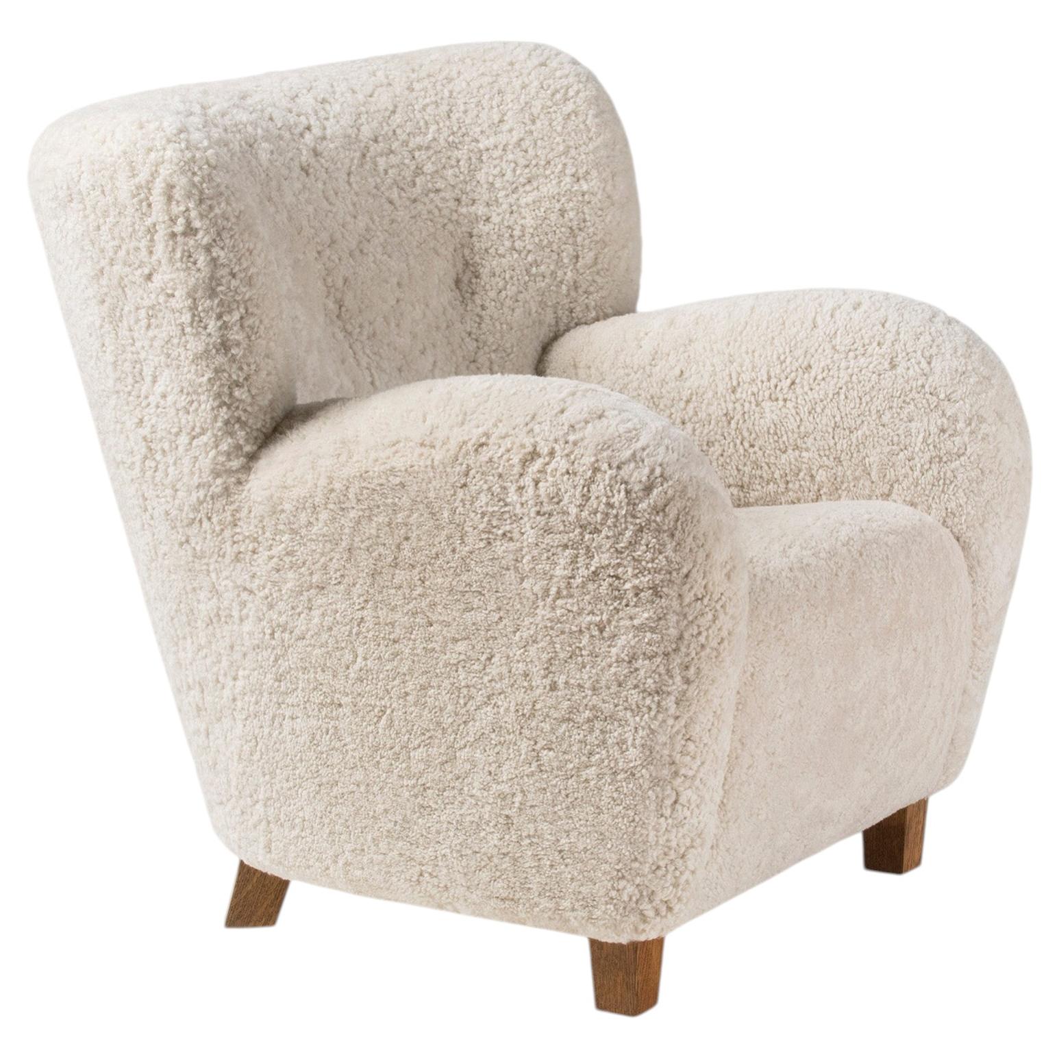 Karu Lounge Chair in Cream Sheepskin by Dagmar