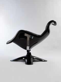 Karuselli Chair and Ottoman by Yrjo Kukkapuro