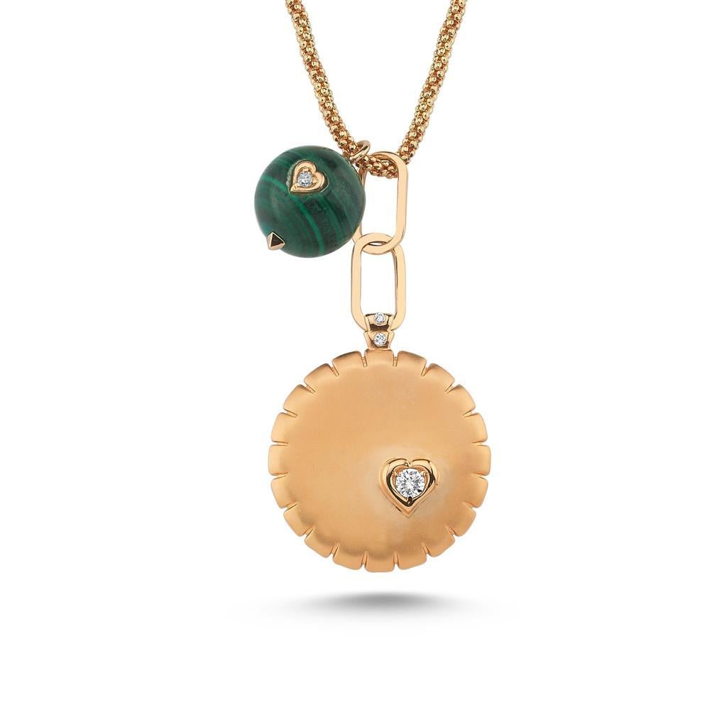 Kashchei medallion with malachite necklace in 14k rose gold by Selda Jewellery

Additional Information:-
Collection: Dragon lady collection
14K Rose gold
0.1ct White diamond
Pendant diameter 1.5cm
Chain lenght 50cm