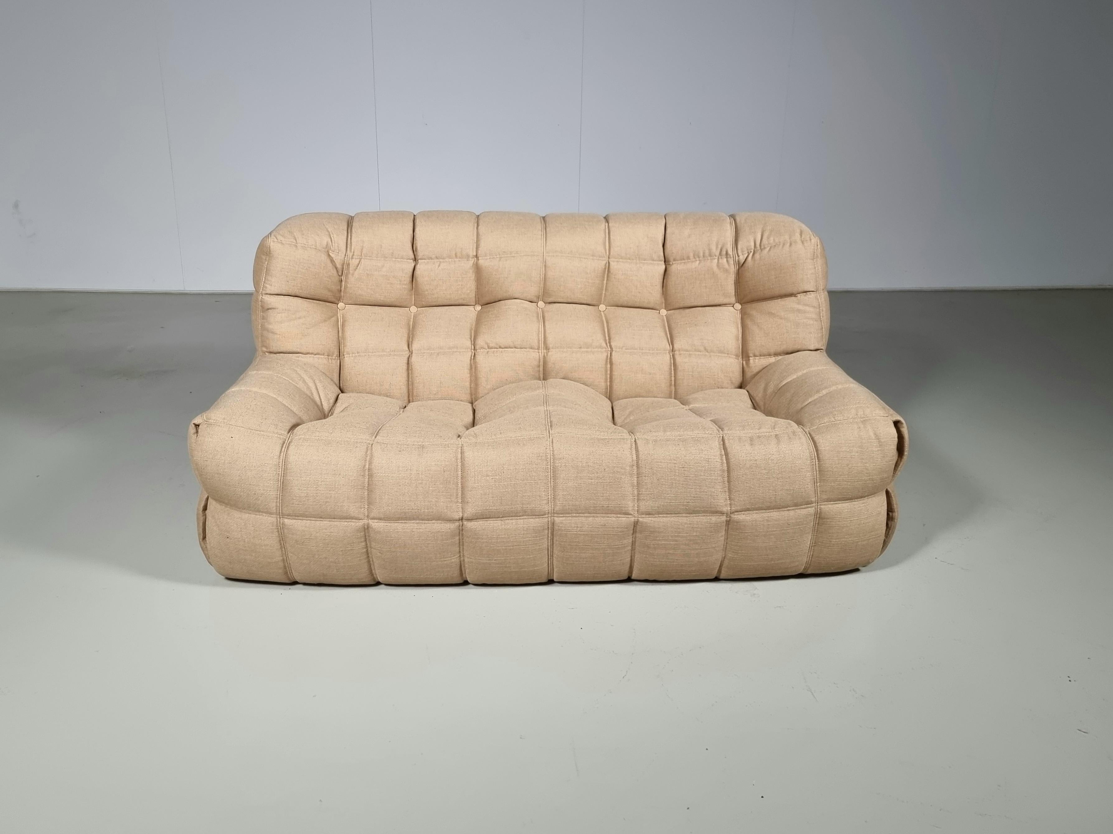 Kashima 2-seater sofa, Michel Ducaroy, Ligne Roset, 1970s

This sofa is an early production signed with Ligne Roset labels on the back and Ligne Roset logo fabric on the undersides

Designed to mimic floating clouds, the square stitched and