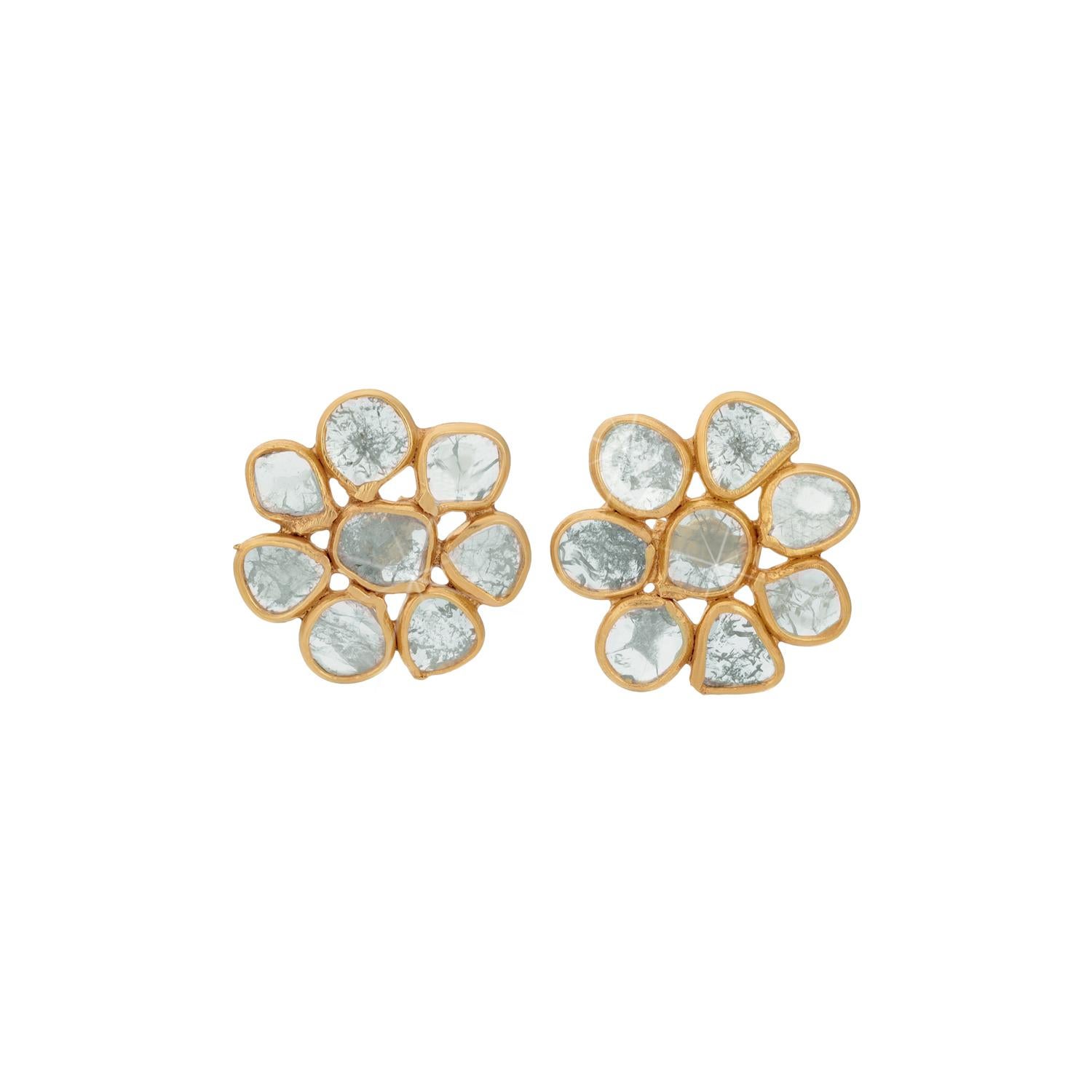 Kashmir Light Blue Sapphire Diaphanous Studs feature finely shaved light blue rose cut sapphires on stud earrings in a flower design of hand crafted gold filigree.

- Rose cut blue sapphires approx 4.20 carats.
- Set in 18 karat gold and silver.
-