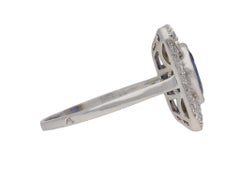 Ceylon sapphire and diamond octagonal cluster ring, French, circa 1925.