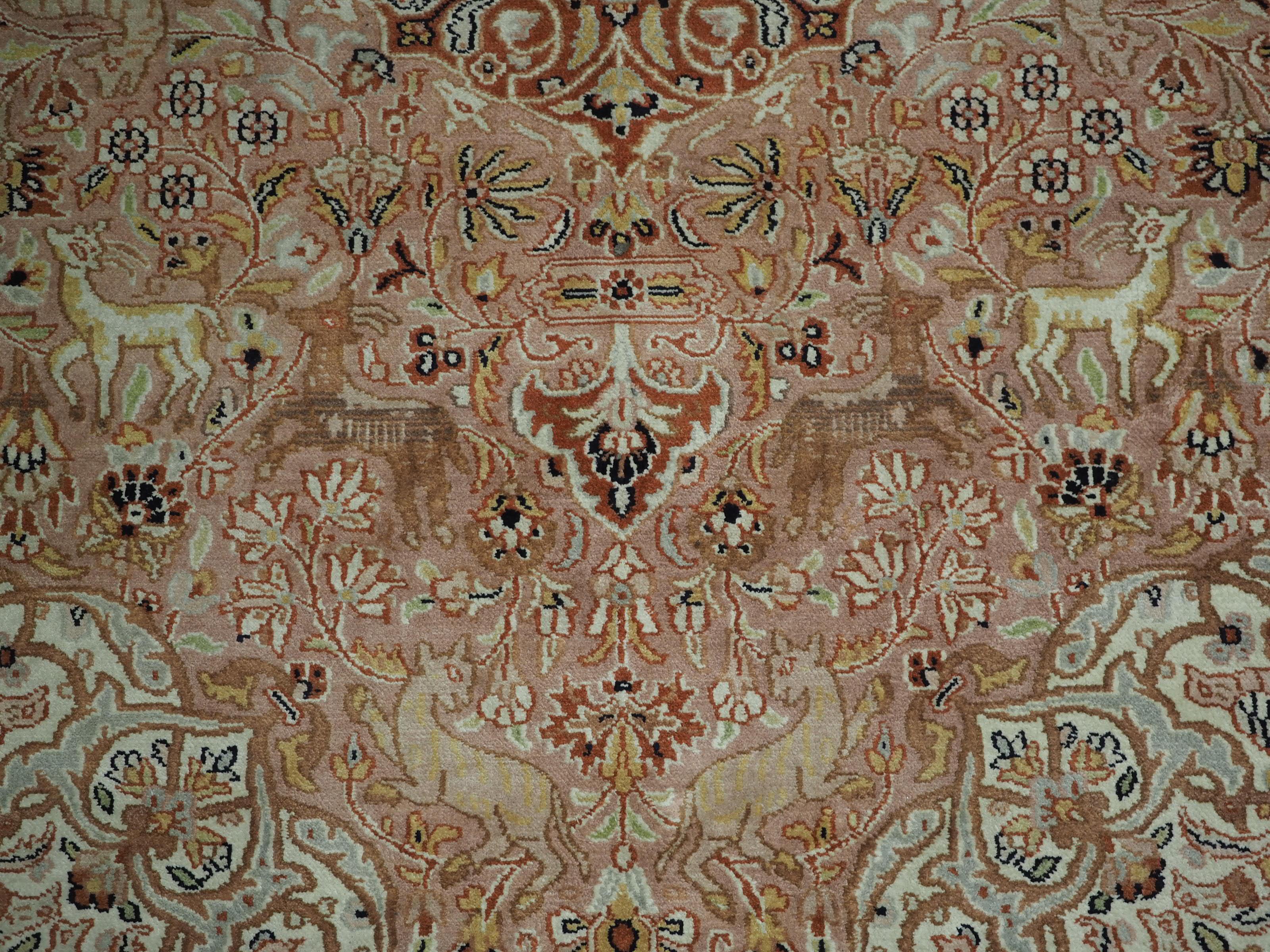 Kashmir silk rug with a small medallion design in garden of animals & flowers. For Sale 4