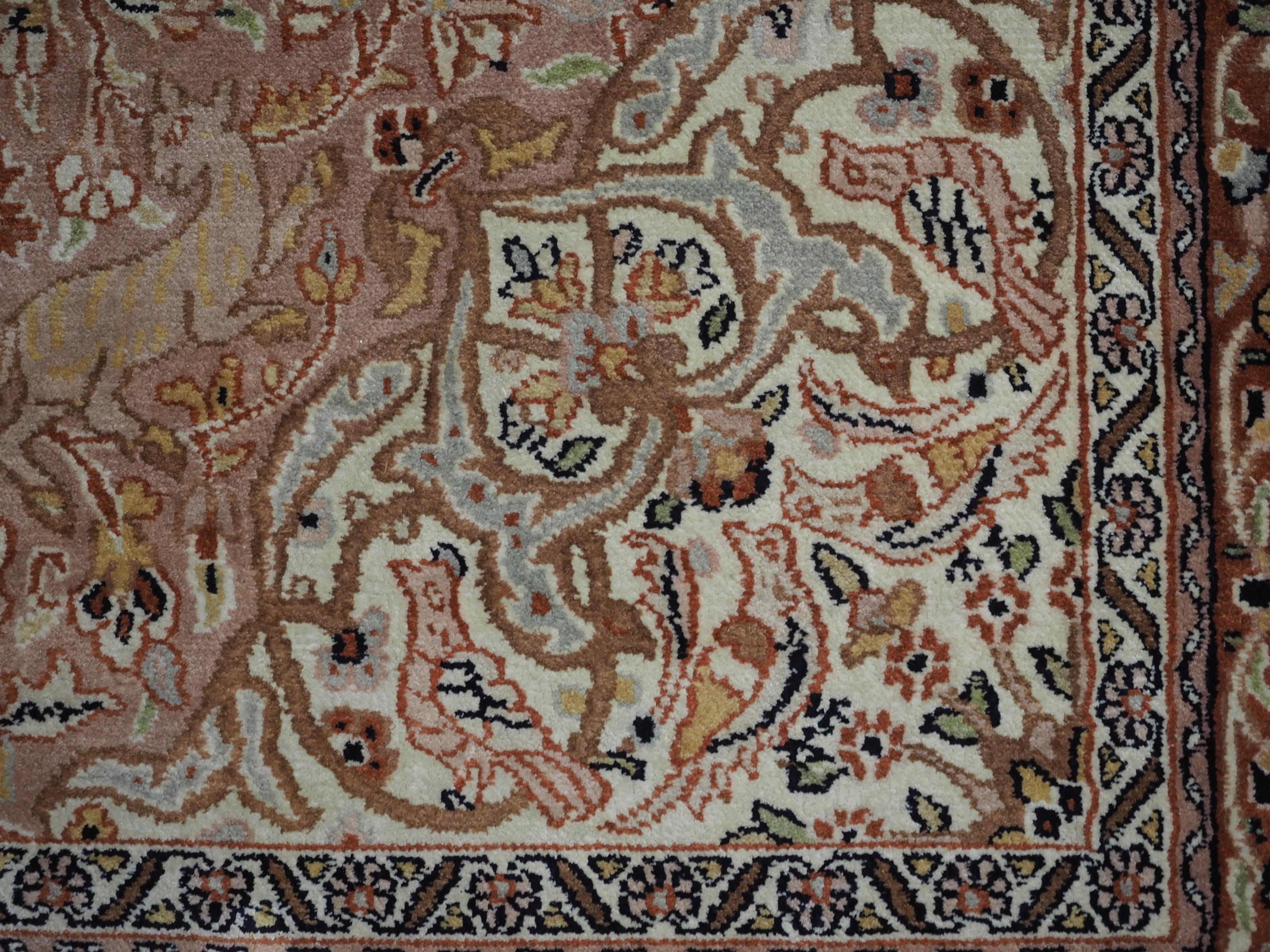 Kashmir silk rug with a small medallion design in garden of animals & flowers. For Sale 5