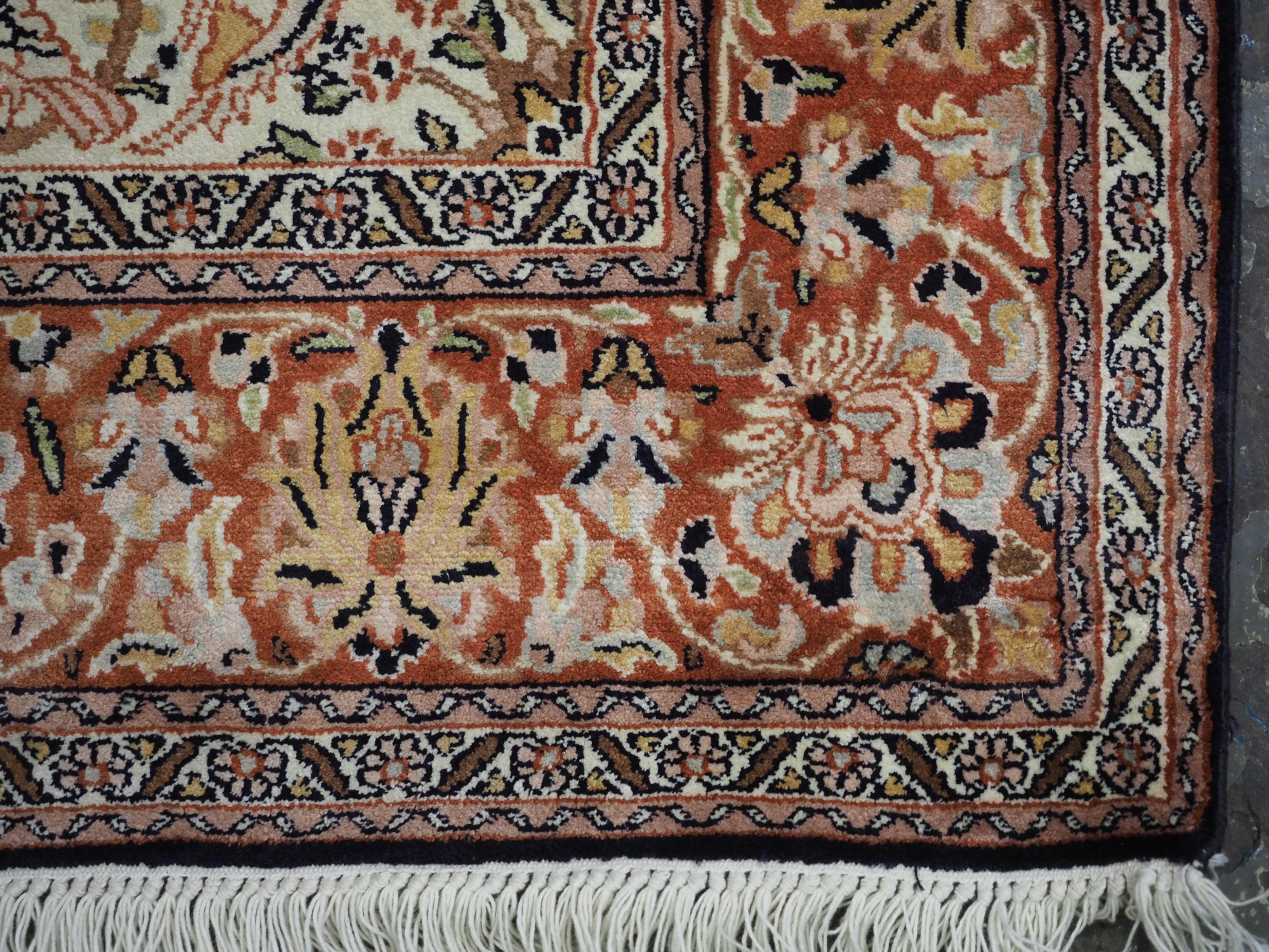 Kashmir silk rug with a small medallion design in garden of animals & flowers. For Sale 6