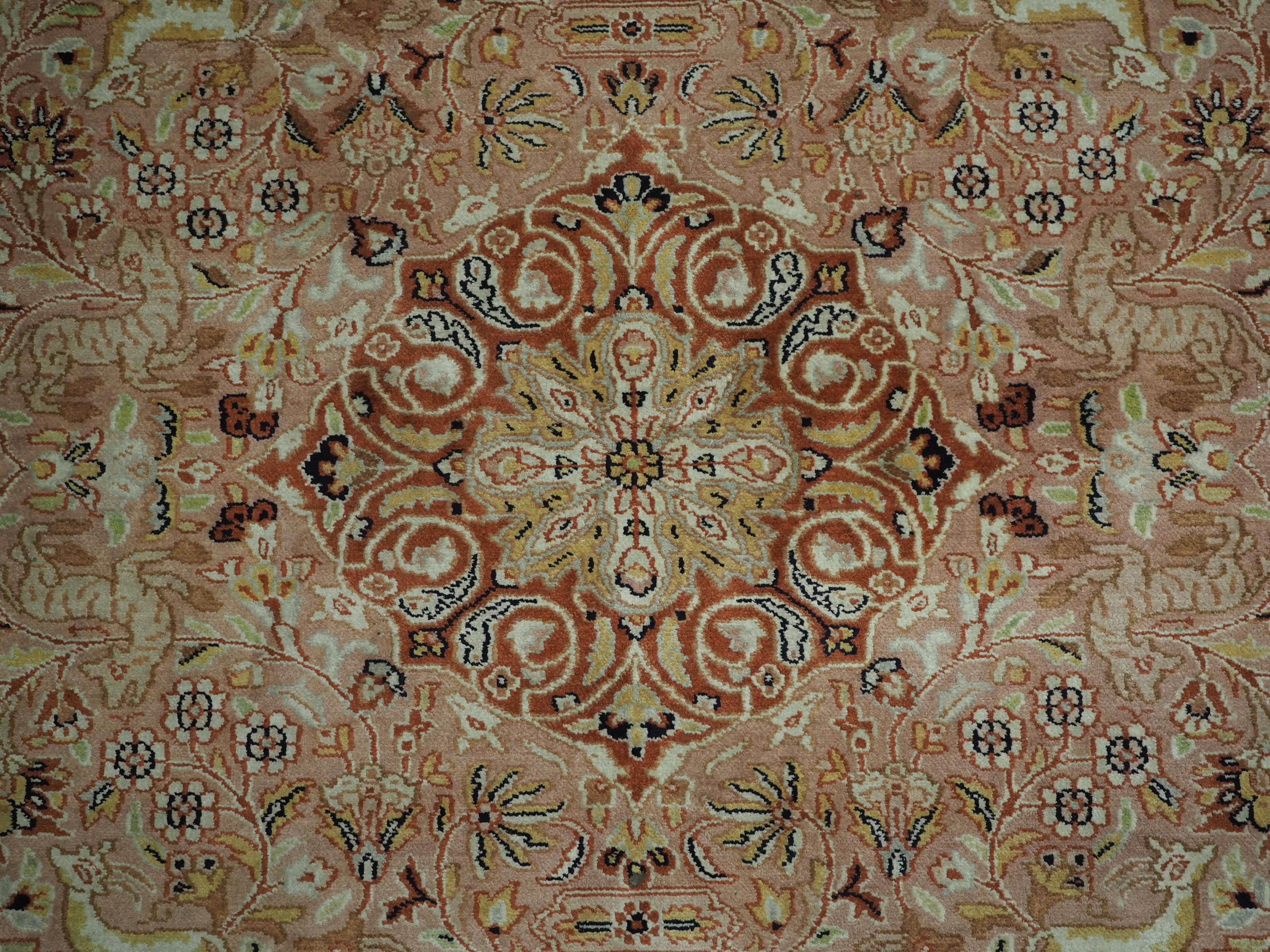 Kashmir silk rug with a small medallion design in garden of animals & flowers. For Sale 2