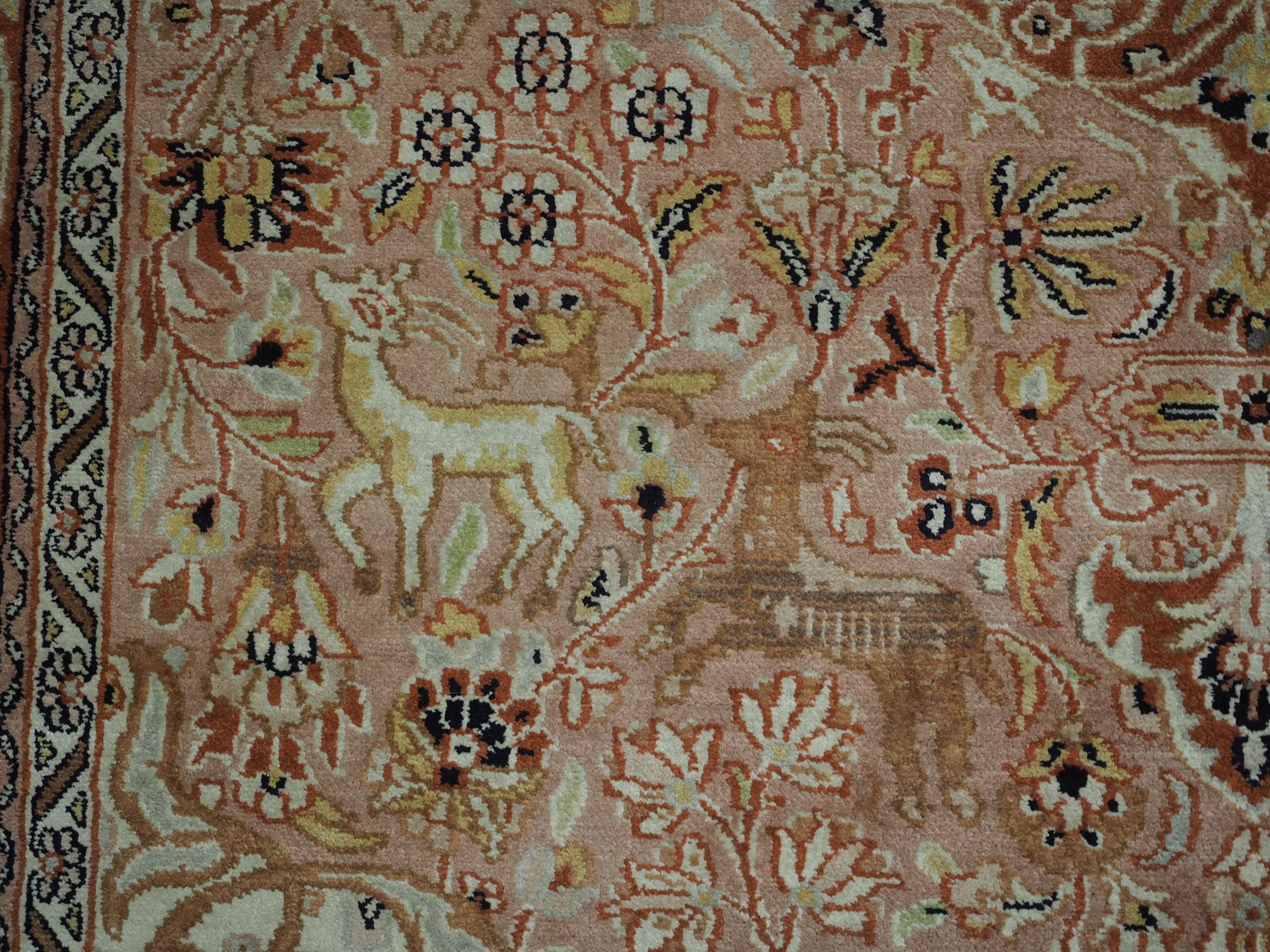 Kashmir silk rug with a small medallion design in garden of animals & flowers. For Sale 3