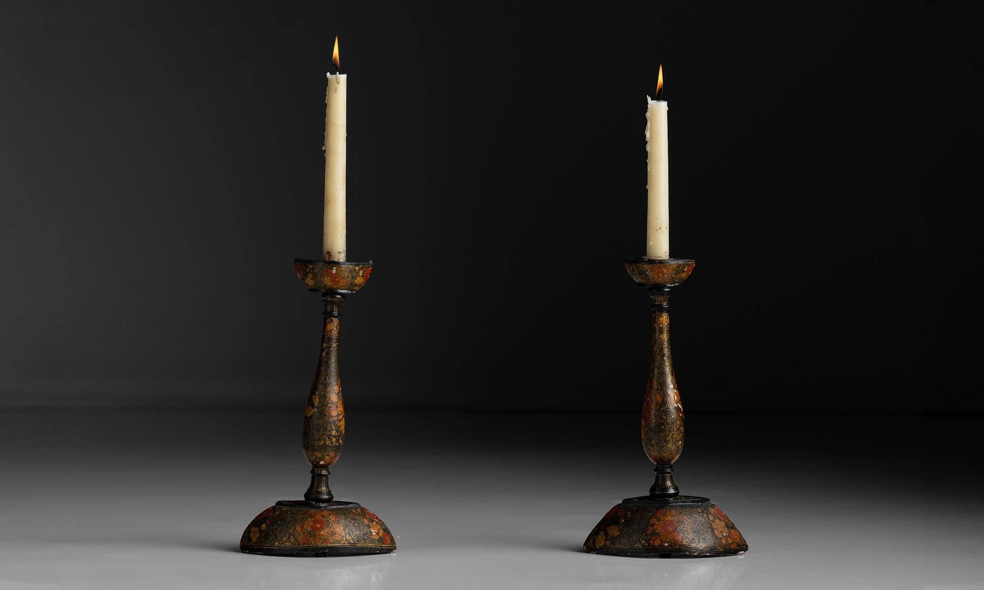 India circa 1910

Oblong shape. Carved wood and lacquer candlesticks with floral motif.

7”w x 4”d x 12”h