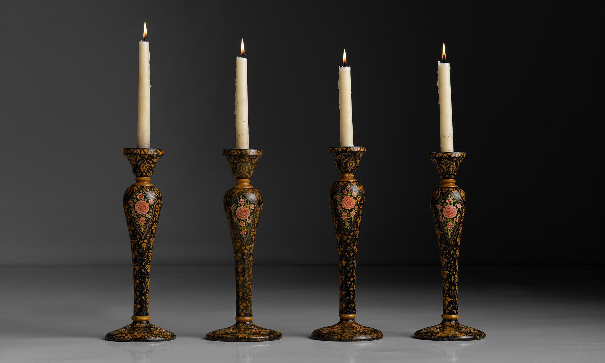 India circa 1910

Carved wood and lacquer candlesticks with floral motif.

5.5”dia x 14”h