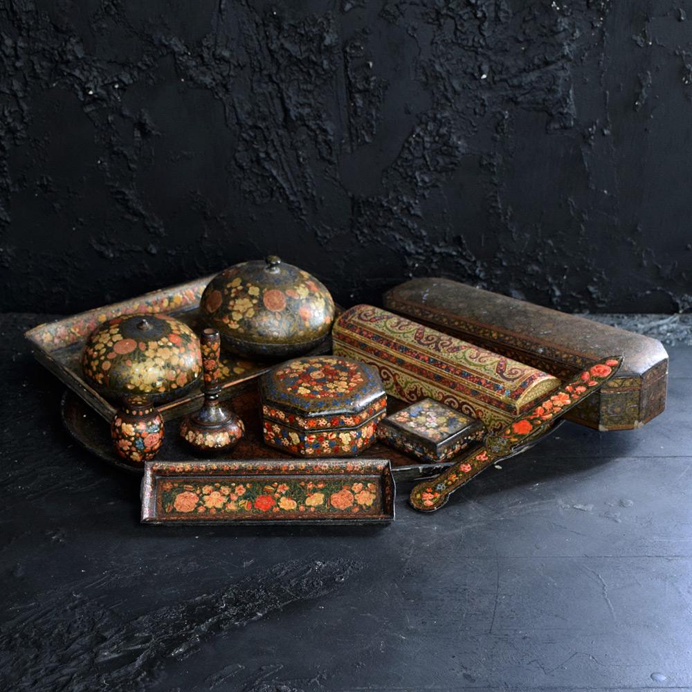 Kashmiri Papier Mache Collection 

We share what we love, and we love this early 20th century collection of papiers Mache Kashmiri assorted objects. Hand painted detail this collection would make a great interior design display. Showing lots of