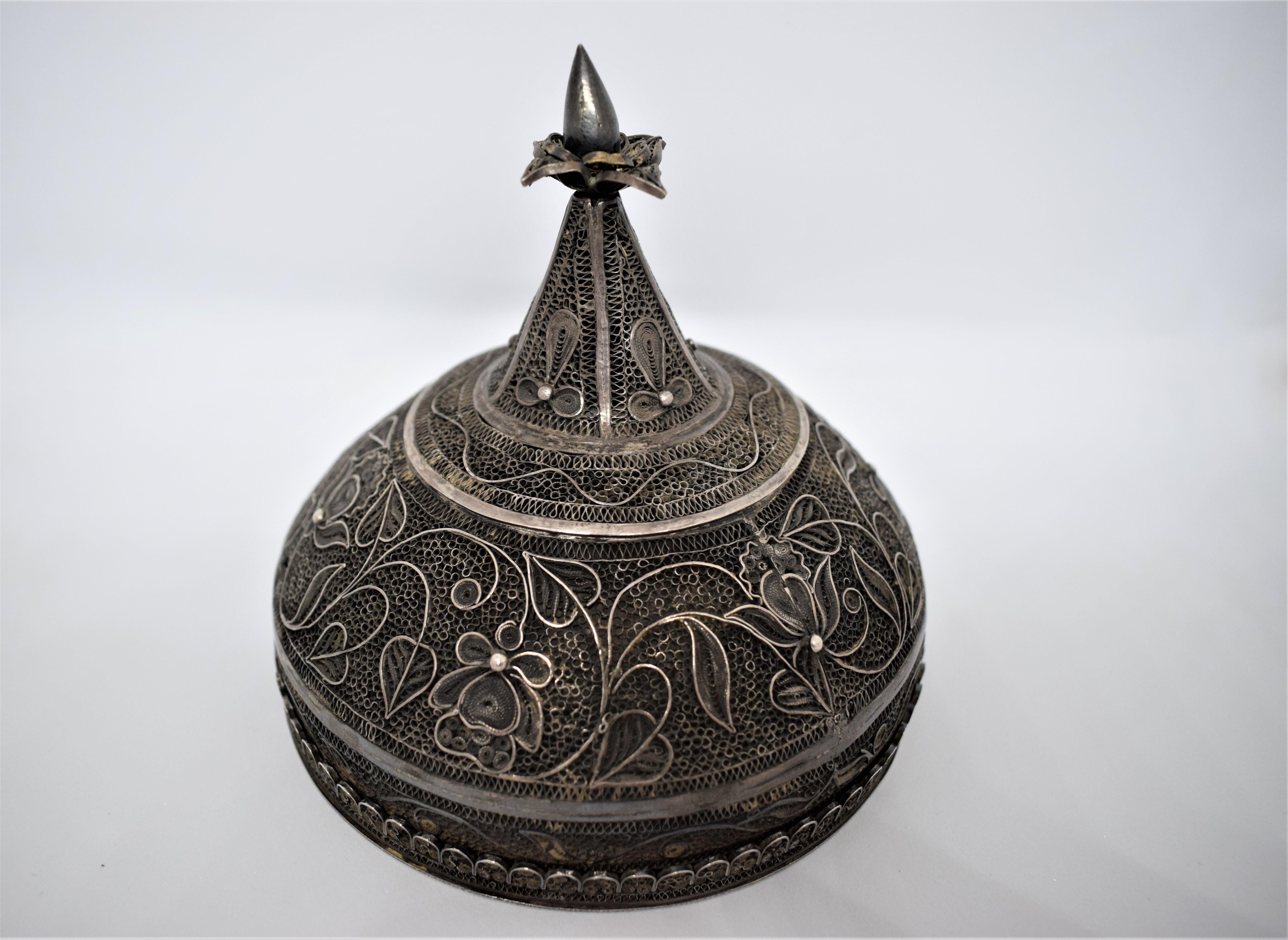 Kashmiri silver betel nut box, Khaas Daan, late 19th century

Betel-chewing is a leisure pastime practiced since ancient times in many parts of south and southeast Asia. It involves wrapping areca nut, slaked lime and other ingredients in a betel