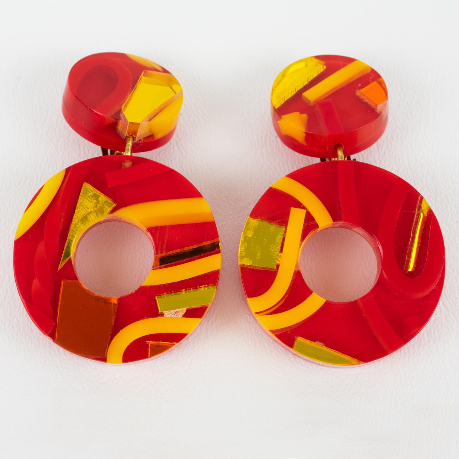 Modern Kaso Dangle Lucite Clip Earrings Red, Orange, Yellow Donut For Sale