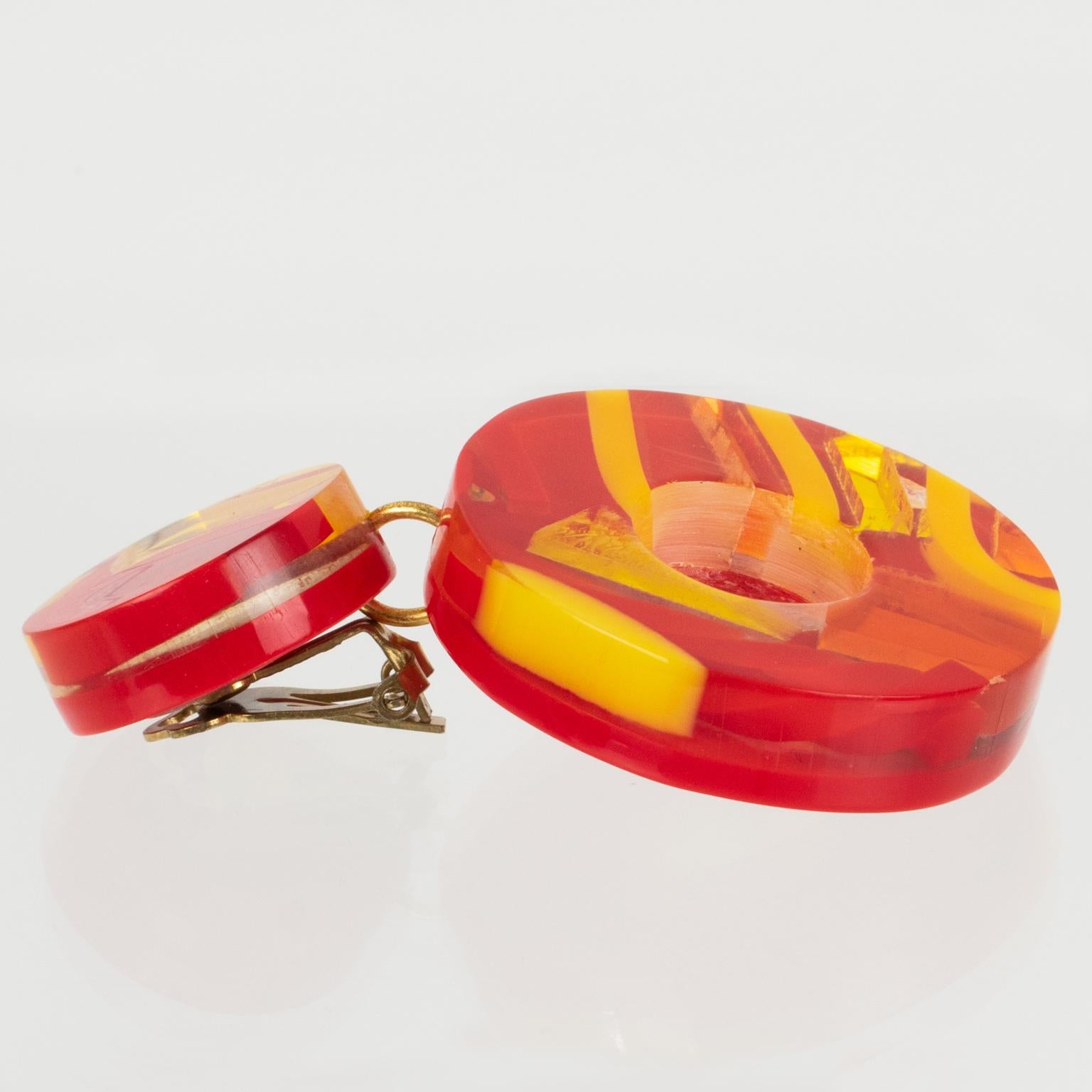 Women's or Men's Kaso Dangle Lucite Clip Earrings Red, Orange, Yellow Donut For Sale