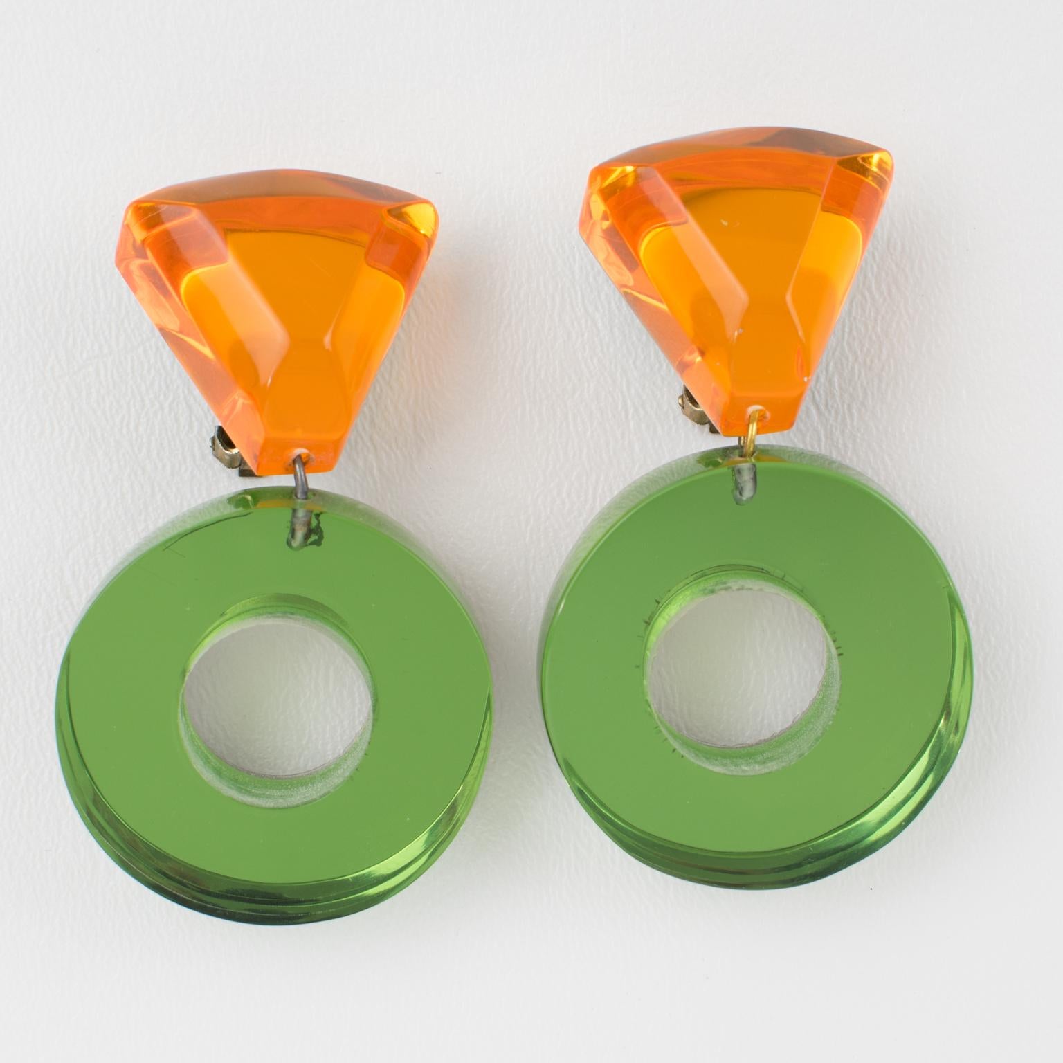 Modern Kaso Lucite Clip Earrings Dangle Green and Orange Donut For Sale