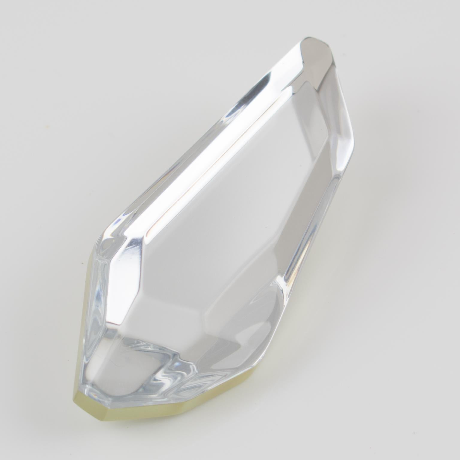 Harriet Bauknight for Kaso designed this stunning oversized Lucite pin brooch. The piece features a dimensional faceted ice cube with a crystal clear mirror texture pattern and beveling edges. The Kaso brand paper sticker was removed. But the solid