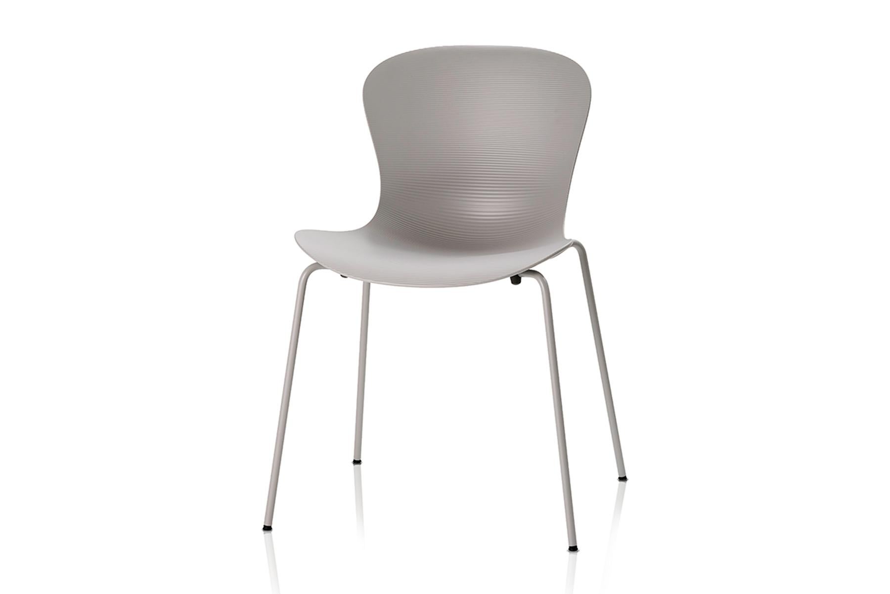 NAP comes in several varieties: stackable with 4 legs or sled and as bar stool or counter stool, all with and without arms. The chair has a high gloss back, and the front of the shell is matt with ripples to emphasize the geometry of the chair. The