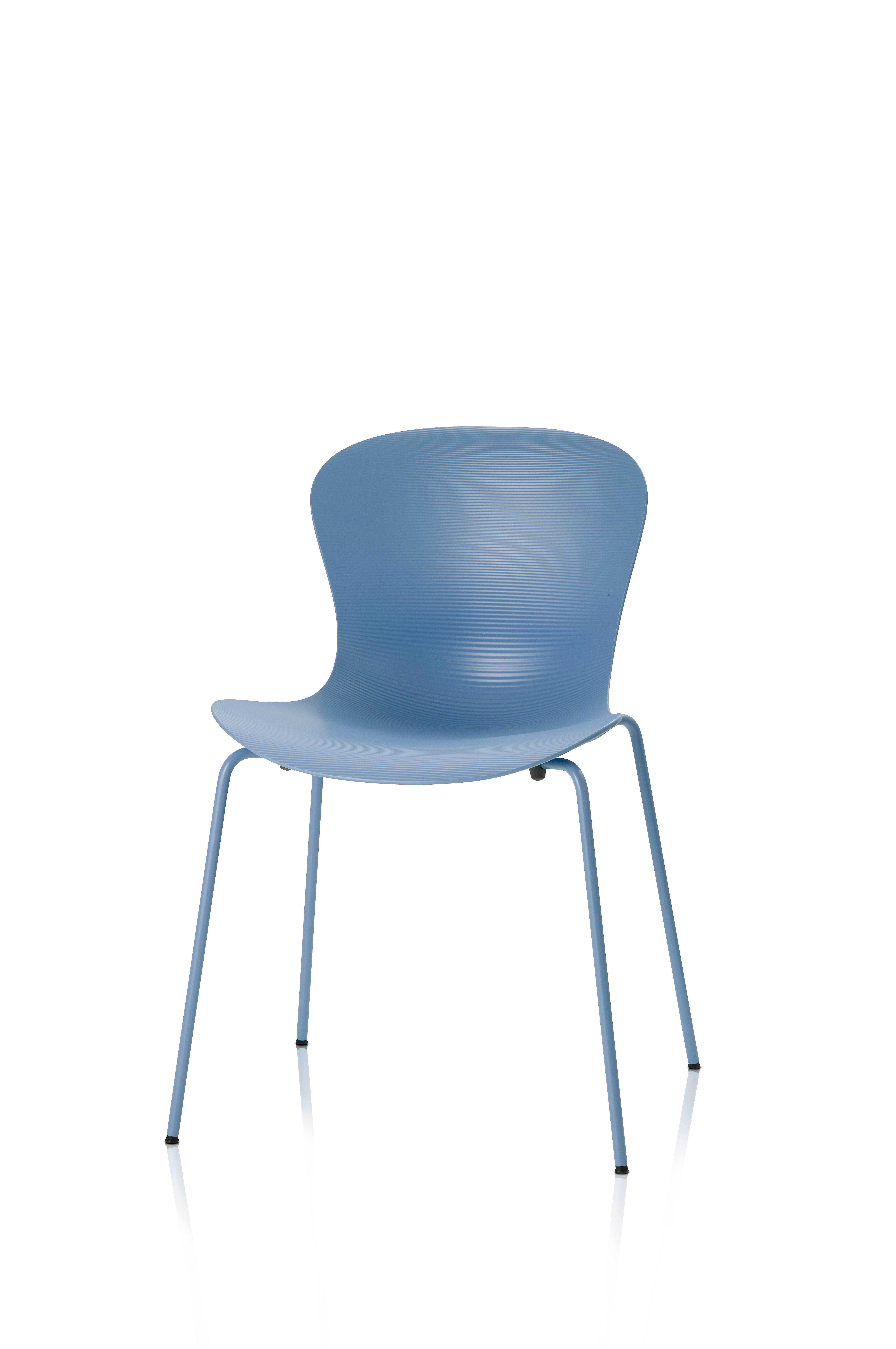 NAP comes in several varieties: stackable with 4 legs or sled and as bar stool or counter stool, all with and without arms. The chair has a high gloss back, and the front of the shell is matt with ripples to emphasize the geometry of the chair. The