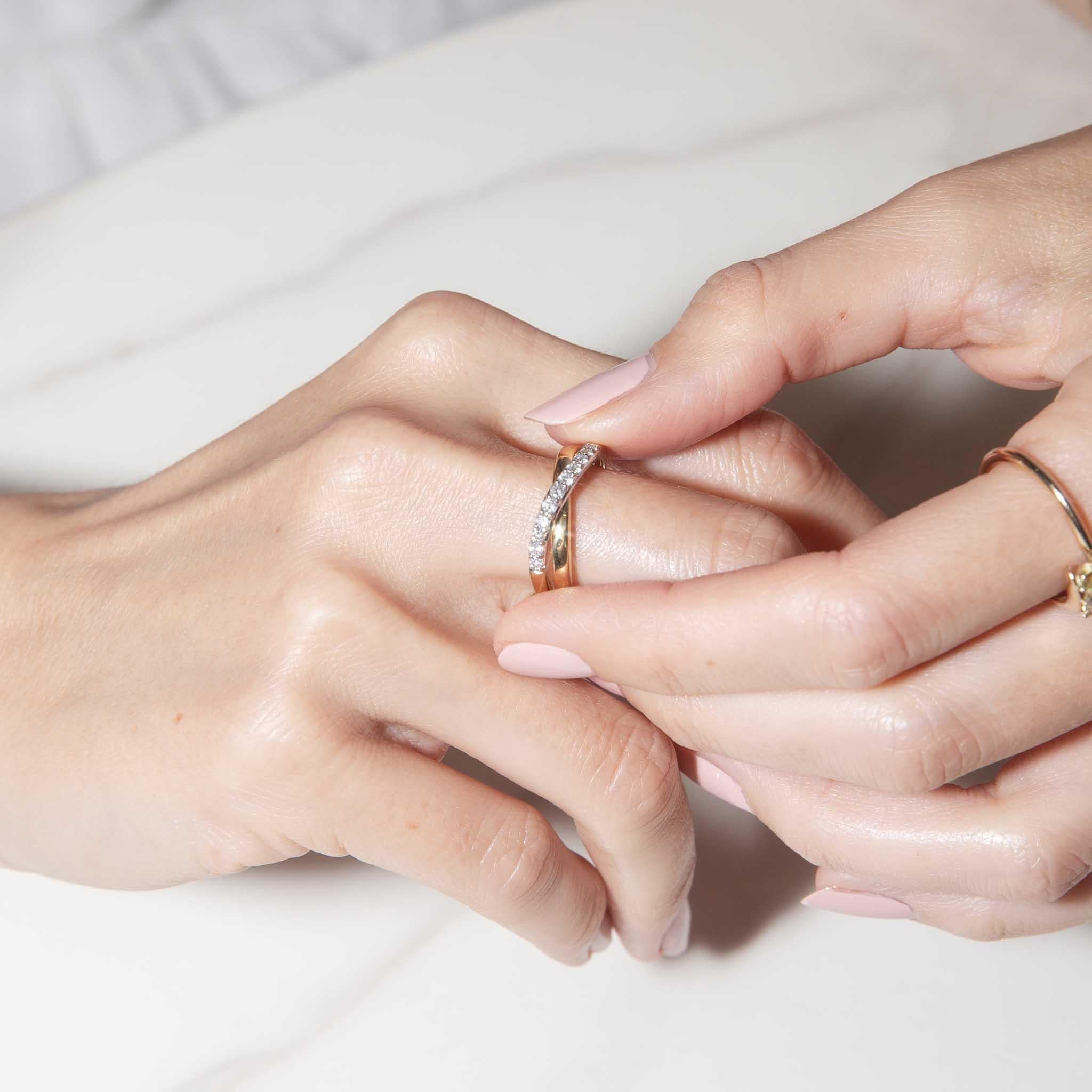 Symbolising the union of two people and everlasting love, The Kassandra Ring is perfect for your someone special.  Crafted in 18 carat gold with ribbons of diamond and gold crossed, she is all gentle curves and sparkle.

The Kassandra Ring Gem