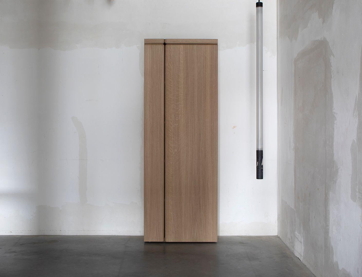 Kast 002 cabinet by Van Rossum
Dimensions: D90 x W40 x H253 cm
Materials: Oak.

The wood is available in all standard Van Rossum colors, or in a matching finish to customer’s own sample.

Tall, sleek storage cabinet in solid Van Rossum oak,