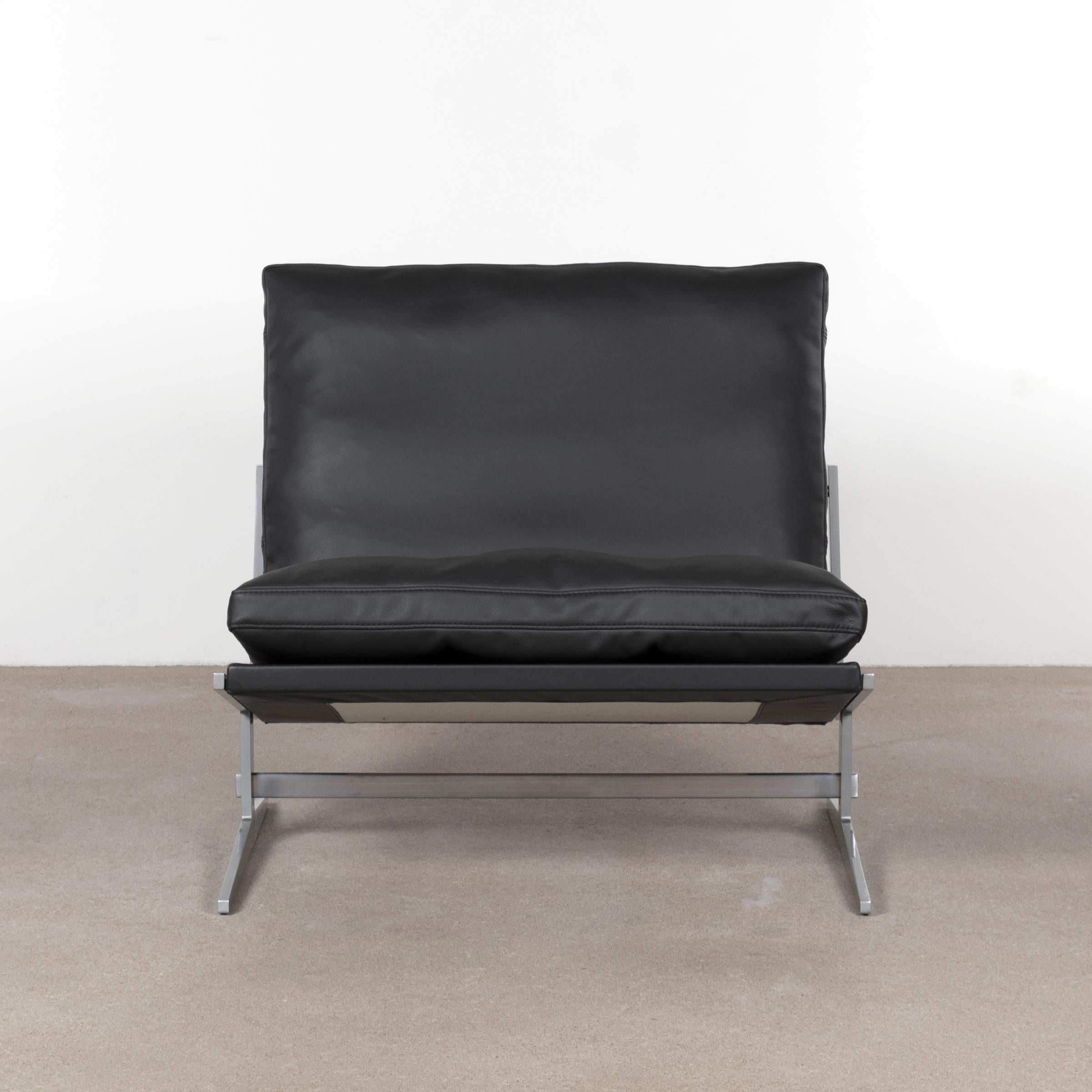 Beautiful slipper lounge chair by Jørgen Kastholm & Preben Fabricius model Bo-561 produced by Bo-Ex in Denmark. The chair is restored with a new upholstery in a very dark green leather. The frame is polished and the cushions are re-filled with new