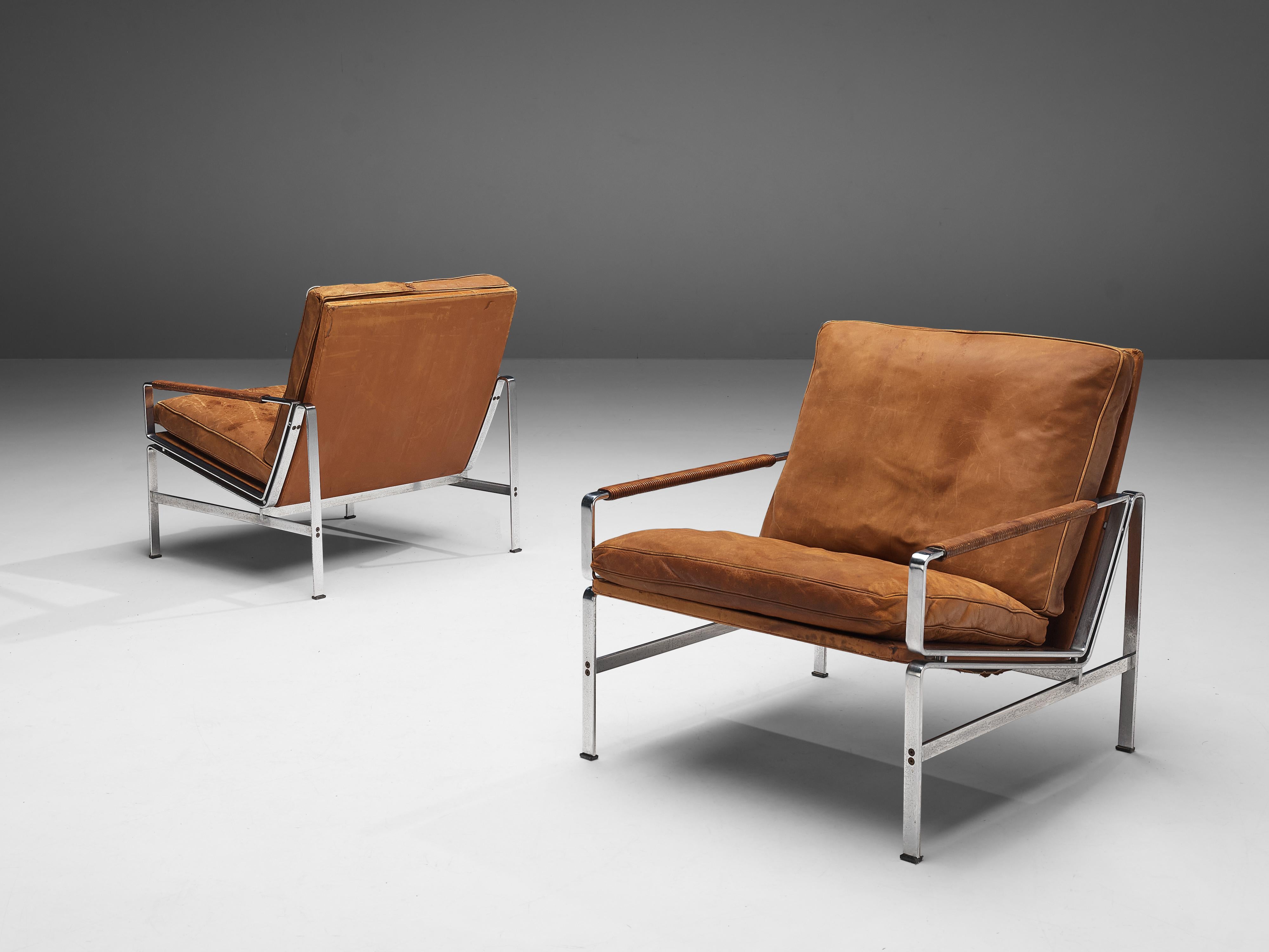 Jørgen Kastholm & Preben Fabricius for Kill Internatonal, lounge chairs model ‘FK 6720’, leather, steel, Denmark, designed in 1965

The lounge chairs model ‘FK 6720’ by Danish designers Jørgen Kastholm and Preben Fabricius catch the eye. It is the