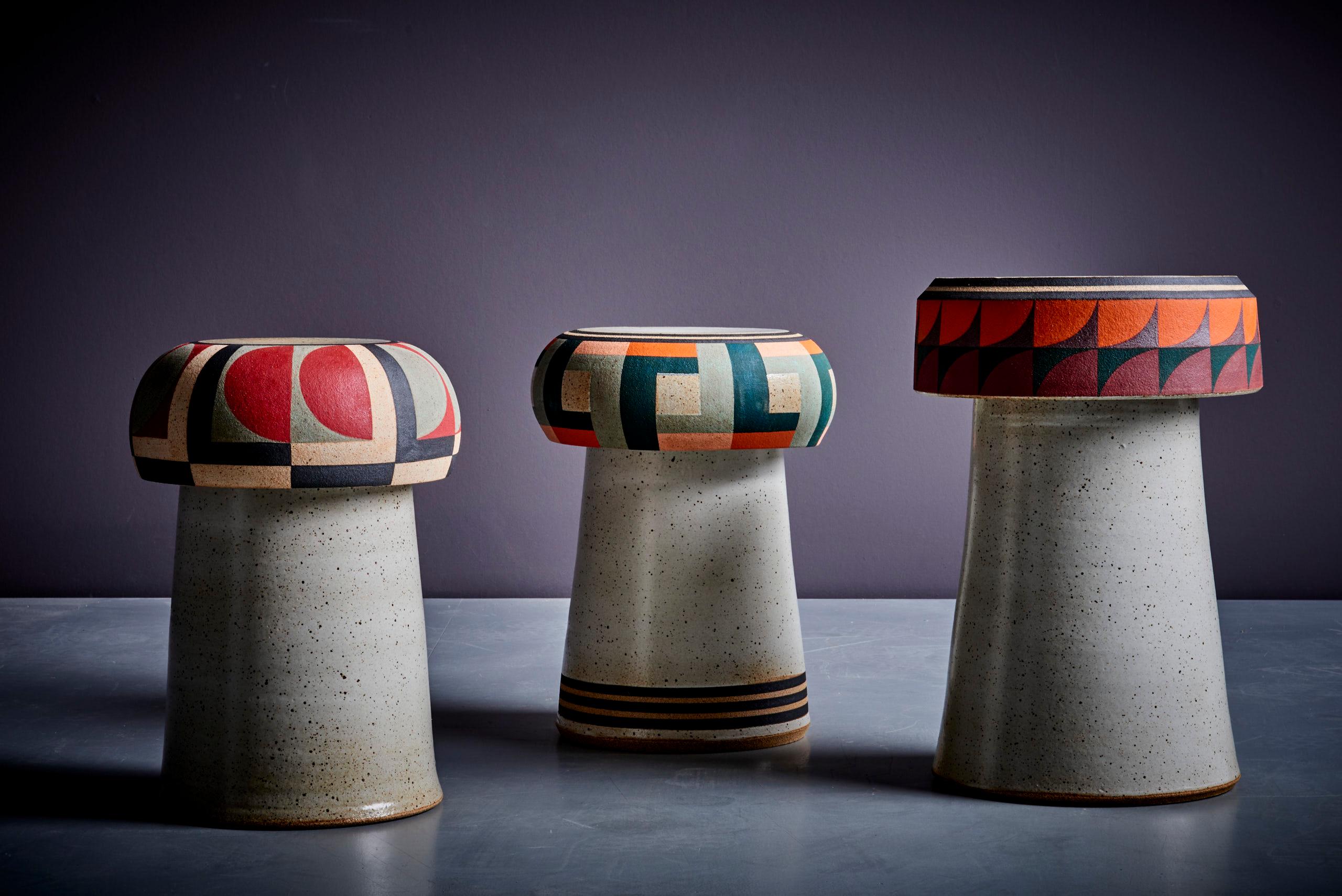 Kat and Roger Set of 3 hand-painted Studio ceramic stools. The measurements given apply to the two stools on the left side (1st photo). The third stool measures 40cm in height and 26cm in diameter 
