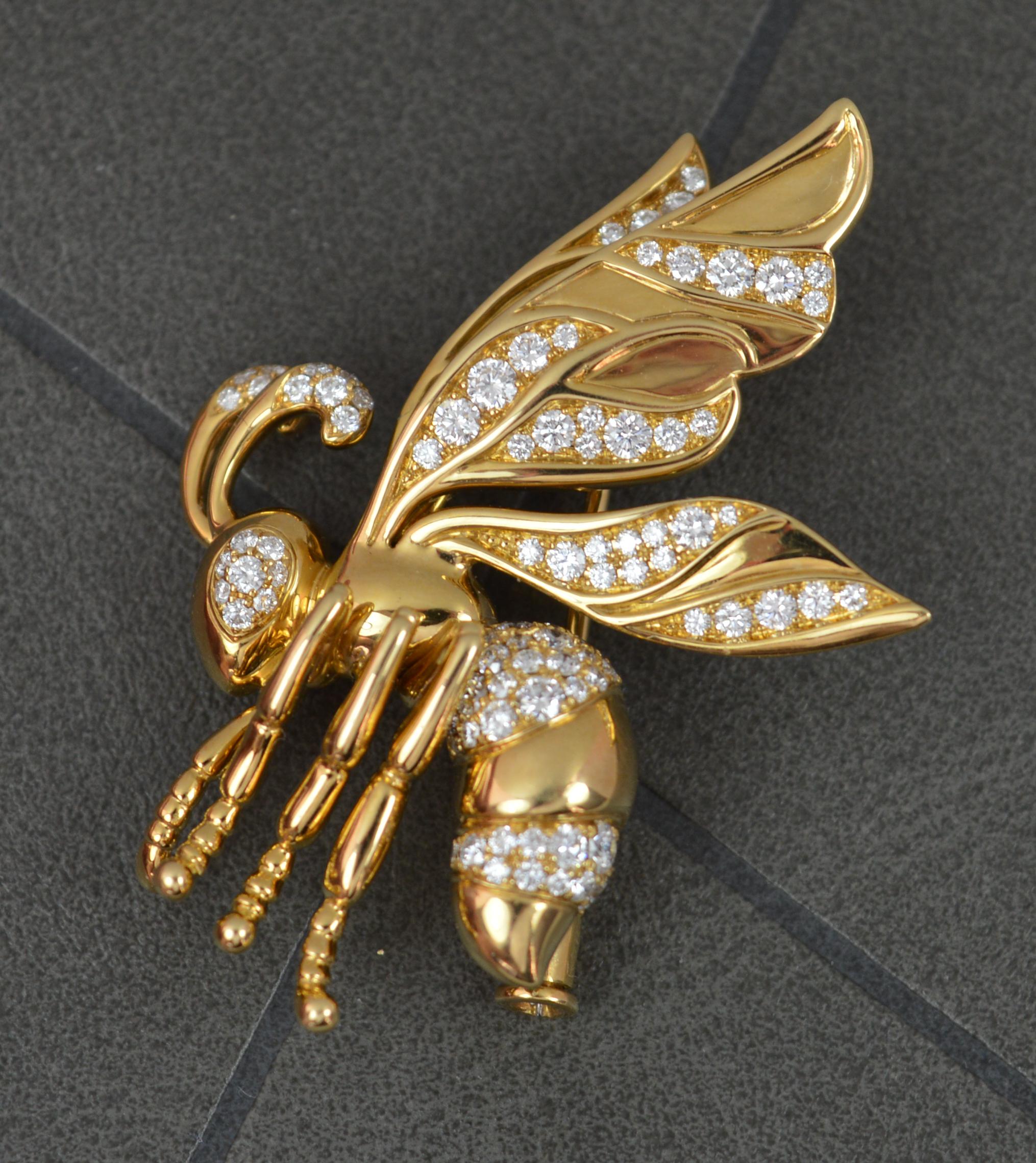 A stunning Kat Florence designer pendant brooch.
Solid and substantial piece, solid 18 carat yellow gold.
Pave set with round brilliant cut diamonds, IF-VVS1, E-F. 0.87 carats total.
Shaped as a wasp. 

CONDITION ; Excellent. Working pin and clasp.