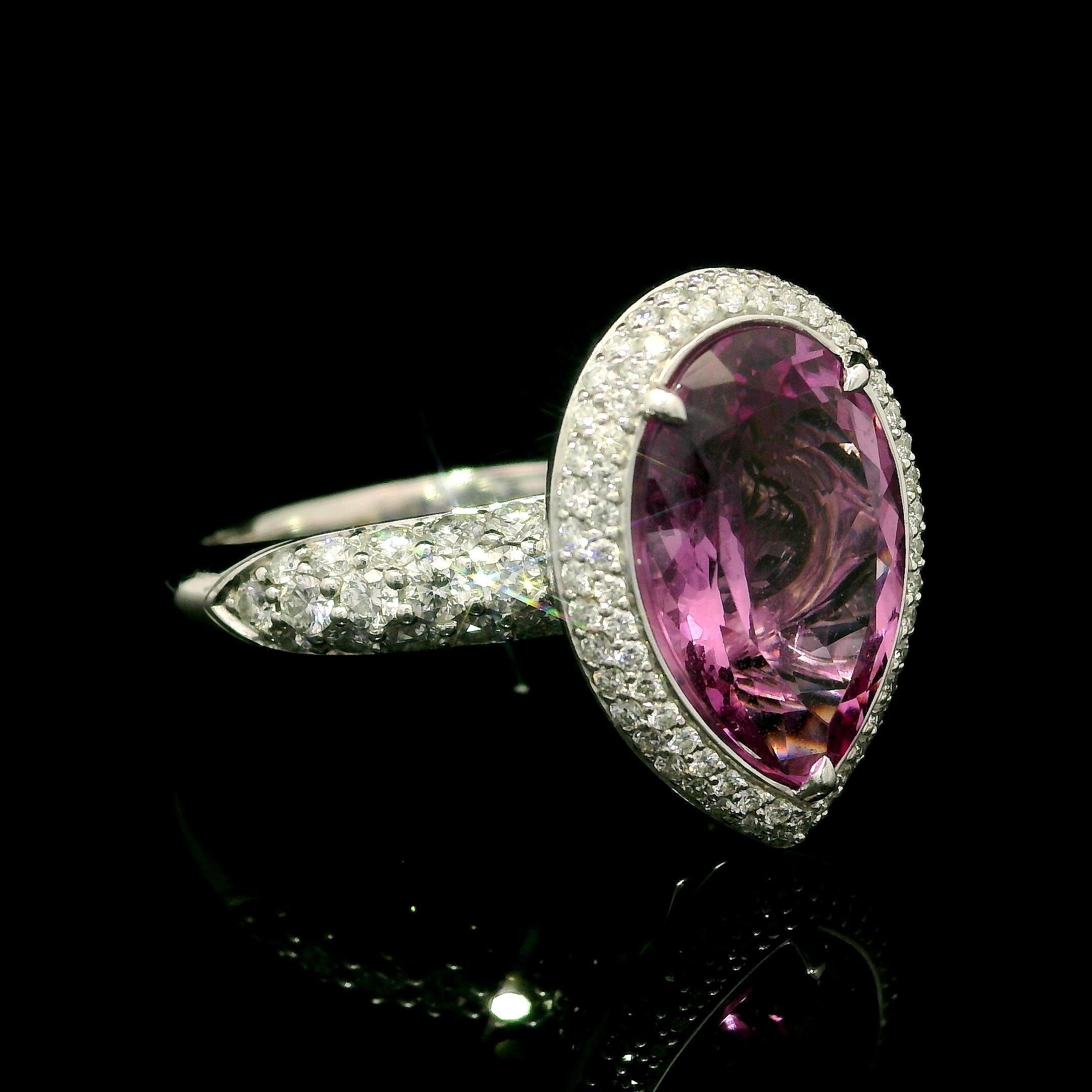 --Stone(s):--
1 Natural Genuine Madagascar Morganite - Pear Cut - Prong Set - Pink Color - 4.39ct exact - certified
110 Natural Genuine Diamonds - Round Brilliant Cut - Pave Set - D Color - Flawless Clarity - 1.05ct exact. as per paper 
Total Carat