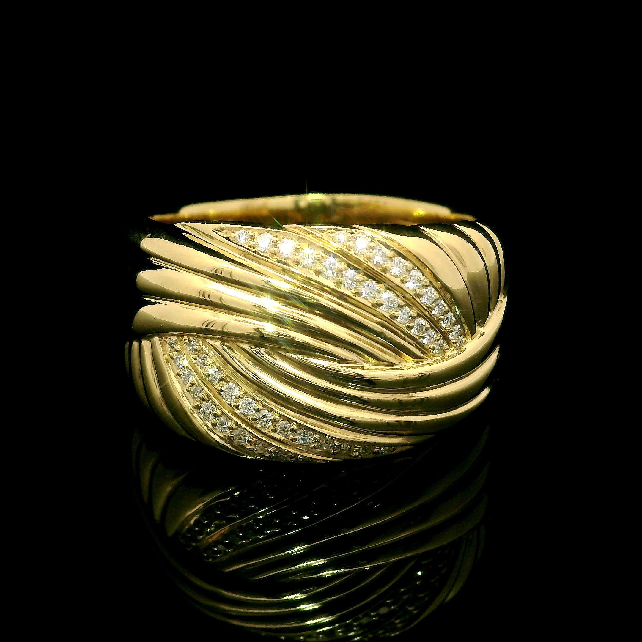 --Stone(s):--
(44) Natural Genuine Diamonds - Round Brilliant Cut - Pave Set - D Color - Flawless Clarity - 0.16ctw (exact. as per paper)
Total Carat Weight: 0.16(exact)

Material: 18k Yellow Gold
Total Weight: 13.54 Grams
Ring Size: 9.5 (Fitted on