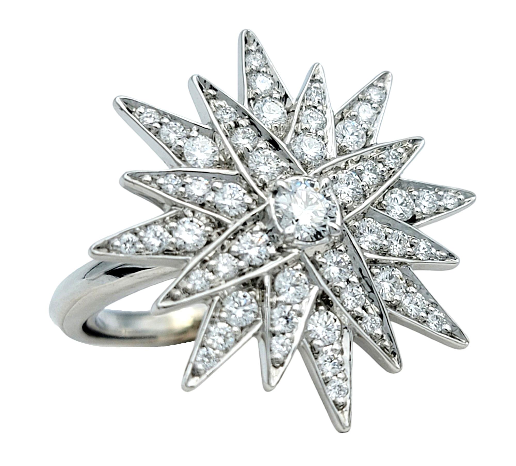 Ring Size: 8

This stunning Kat Florence diamond starburst ring in 18 karat white gold is a mesmerizing piece of jewelry that captures the essence of celestial beauty. Each flawless diamond, graded D on the color scale, reflects the purest