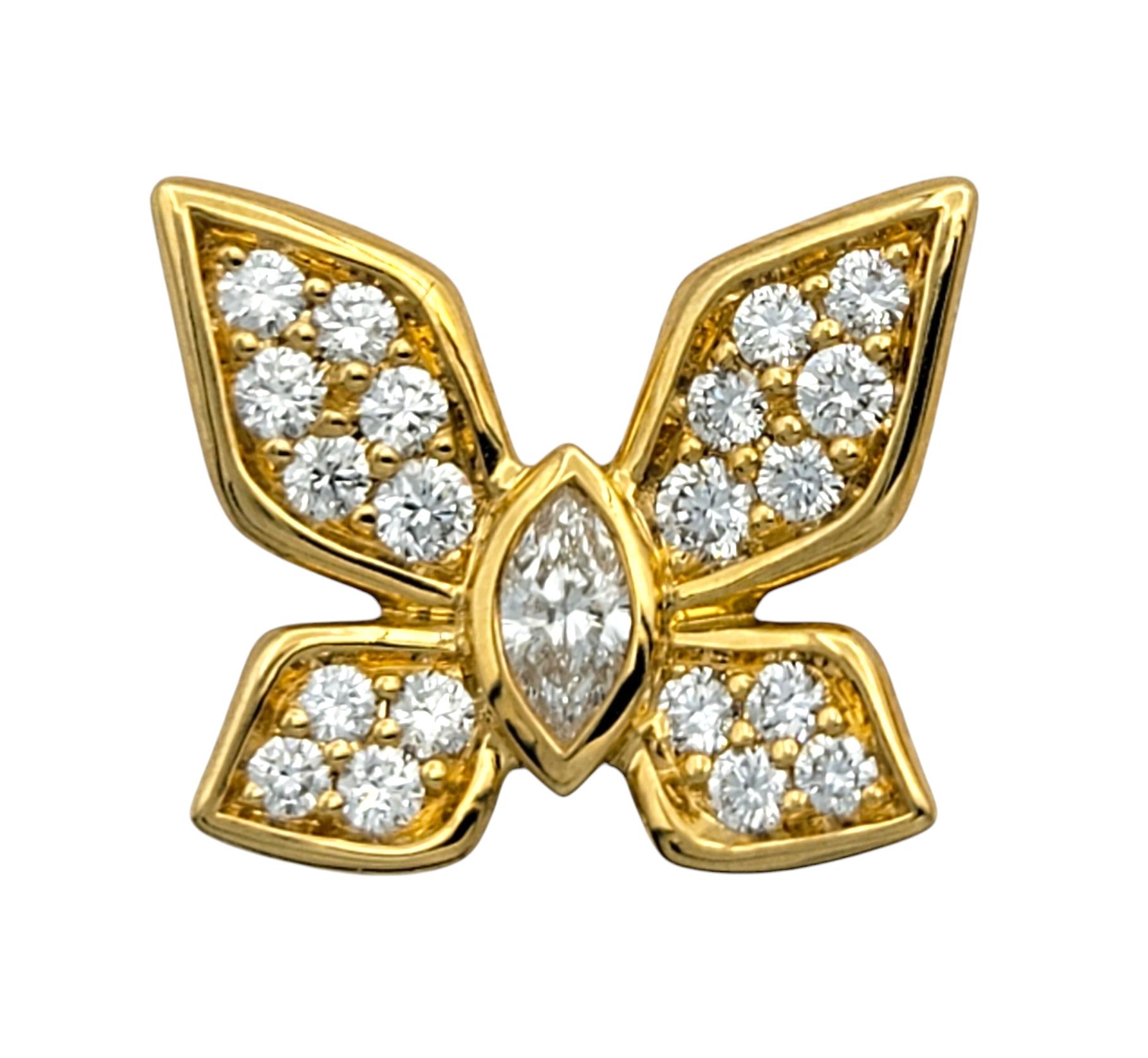 Delicately capturing the grace of nature, these exquisite butterfly stud earrings by Kat Florence are a testament to timeless elegance. Crafted in radiant 18 karat yellow gold, each butterfly is brought to life with a flawless marquise diamond,