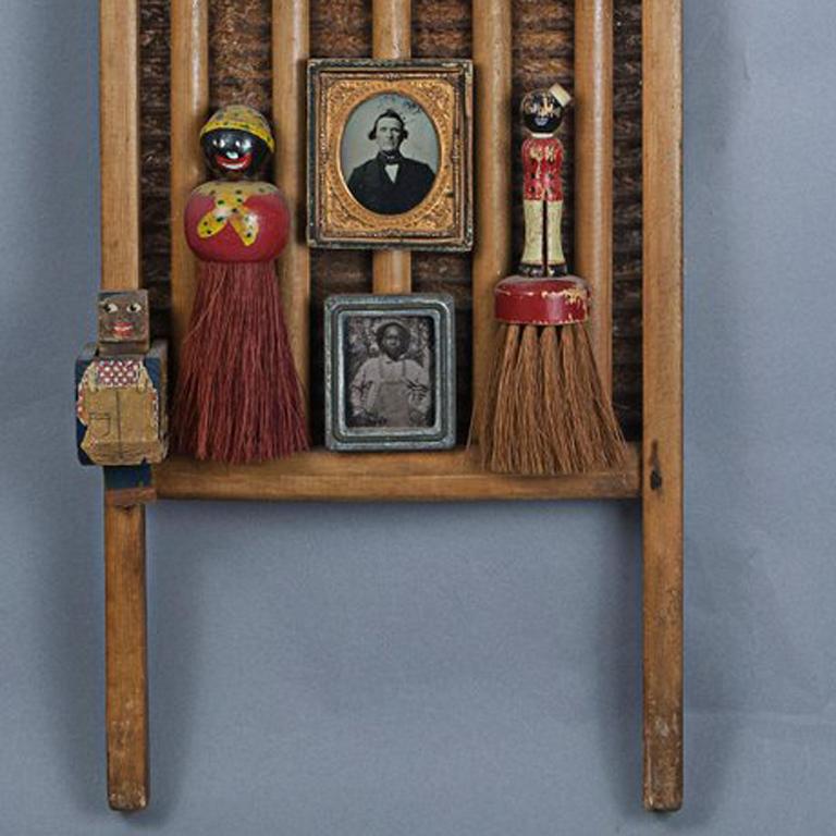 King Cotton was a slogan of the Deep South. The stereotyped wood figures on top are jubilant. The photos represent the two opposing sides of the slave economy.

---

Kat Flyn is a self-taught assemblage artist working presently out of San Diego. She
