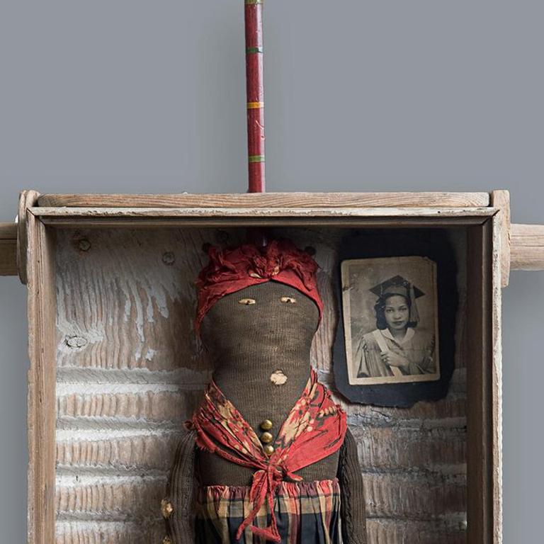 This work pays homage to the sacrifices that were made – especially by African-American women working menial labor jobs – so that the next generation could have a chance for a better life.

---

Kat Flyn is a self-taught assemblage artist working