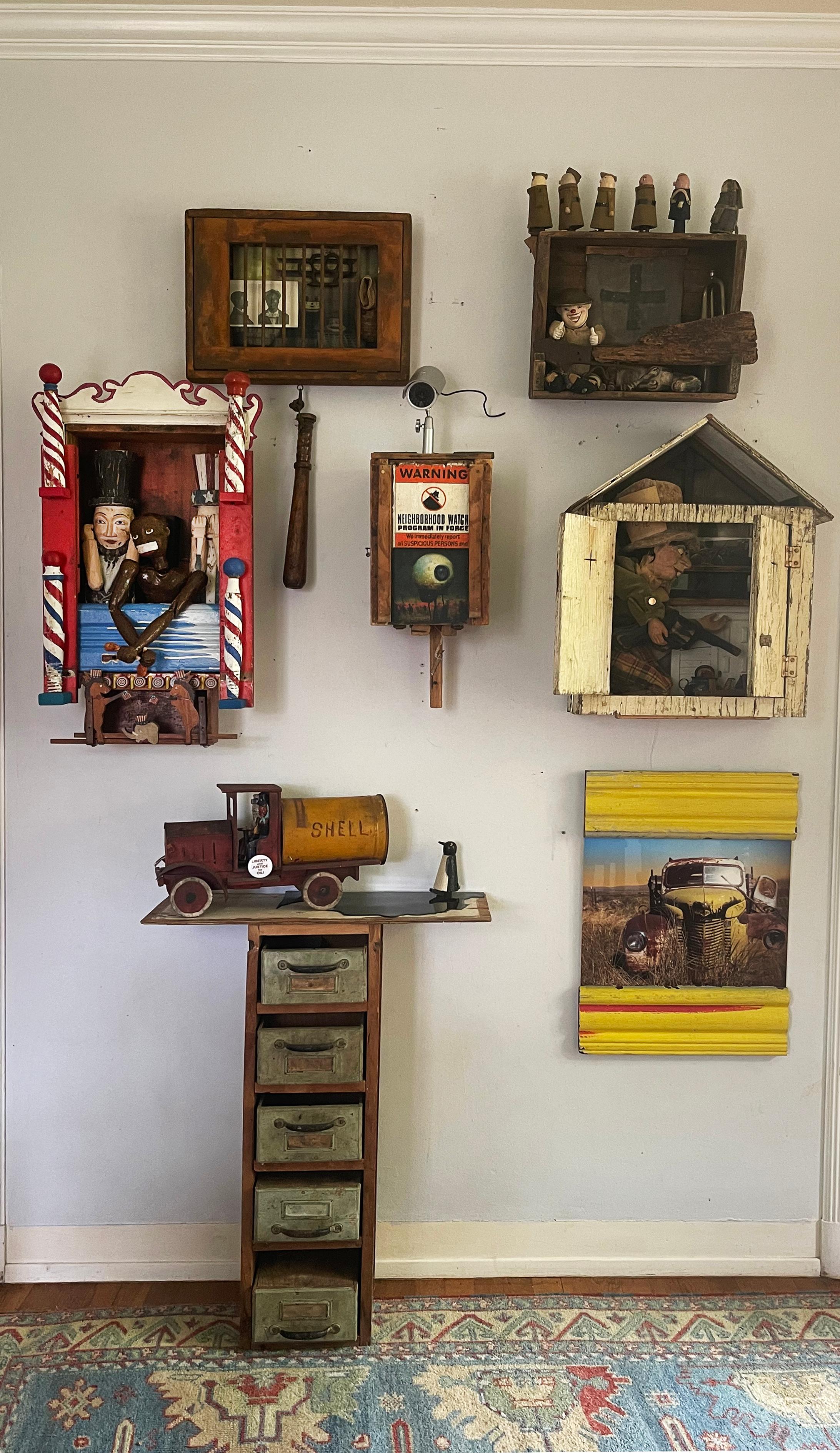KAT FLYN is a self-taught assemblage artist working presently out of San Diego. She began her career as a costume designer in Southern California. Over the years she amassed a trove of artifacts and collectables which she began using to create