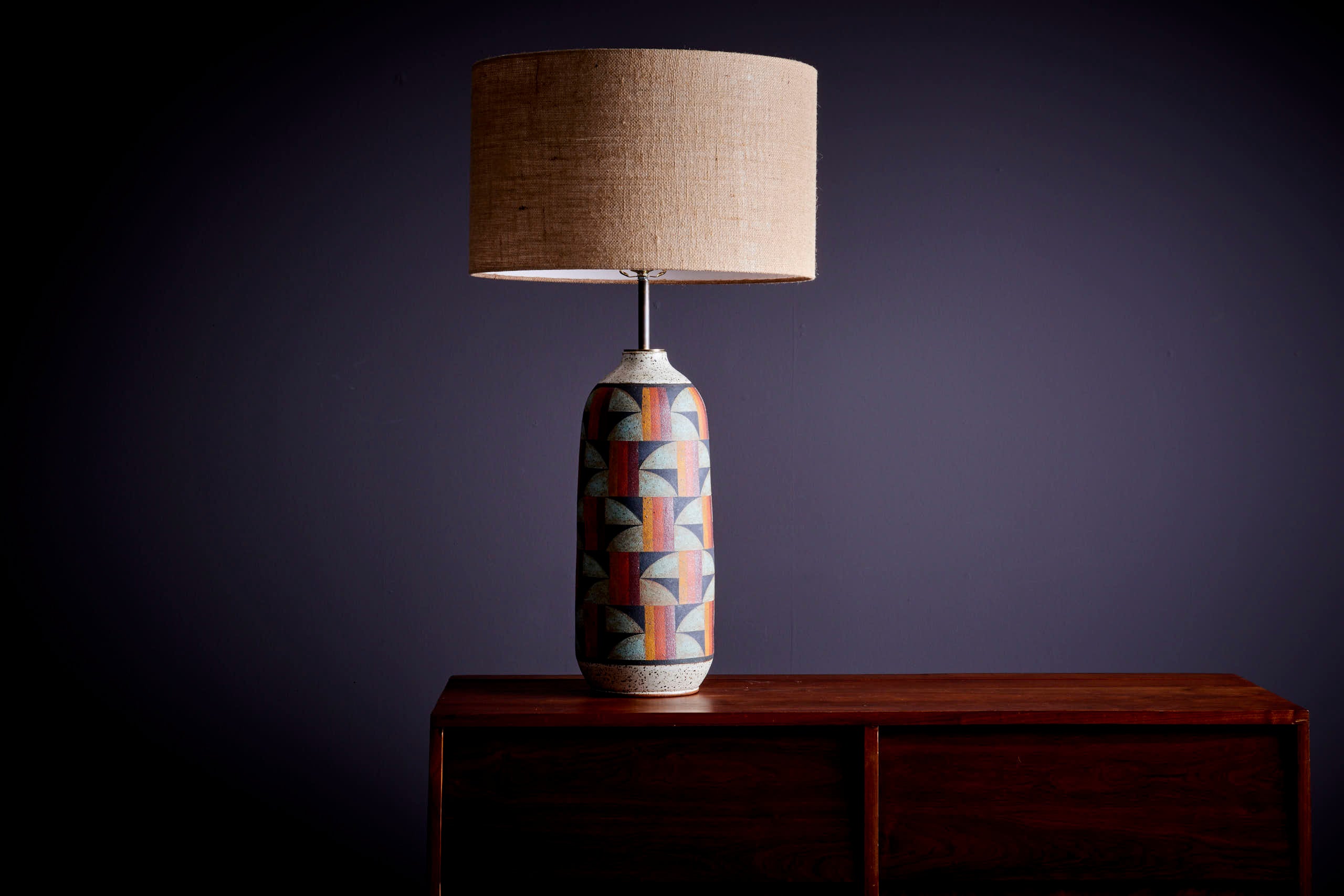 Kat & Roger Table Lamp with hand-crafted and hand-painted ceramic base, USA. Measurements given apply to the base of the lamp. 

Nestled amidst the serene landscapes of Southern California, ceramic artists Kat Hutter and Roger Lee have been quietly