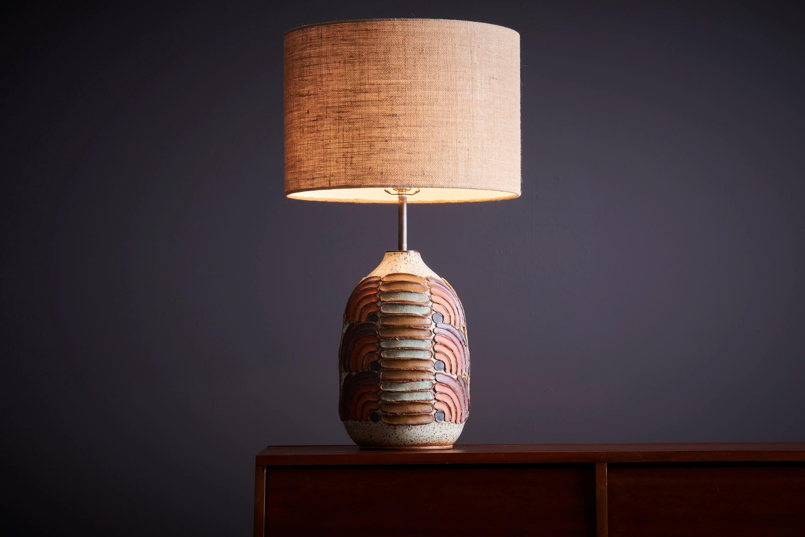 Kat & Roger Table Lamp with hand-crafted and hand-painted ceramic base, USA. Measurements given apply to the base of the lamp. 

Nestled amidst the serene landscapes of Southern California, ceramic artists Kat Hutter and Roger Lee have been quietly