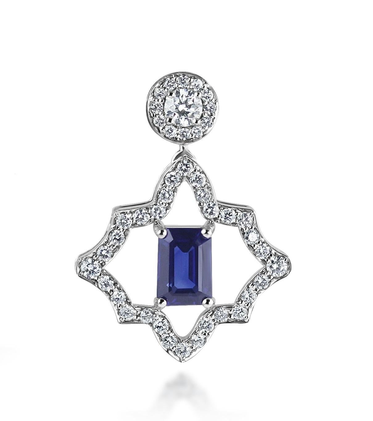 A stunning pair of diamond & sapphire stud earrings with a never ending, infinity, line of diamonds surrounding the central sapphire.  The earrings have movement to them, allowing them to sparkle even more!  

This is a very beautiful and intriguing